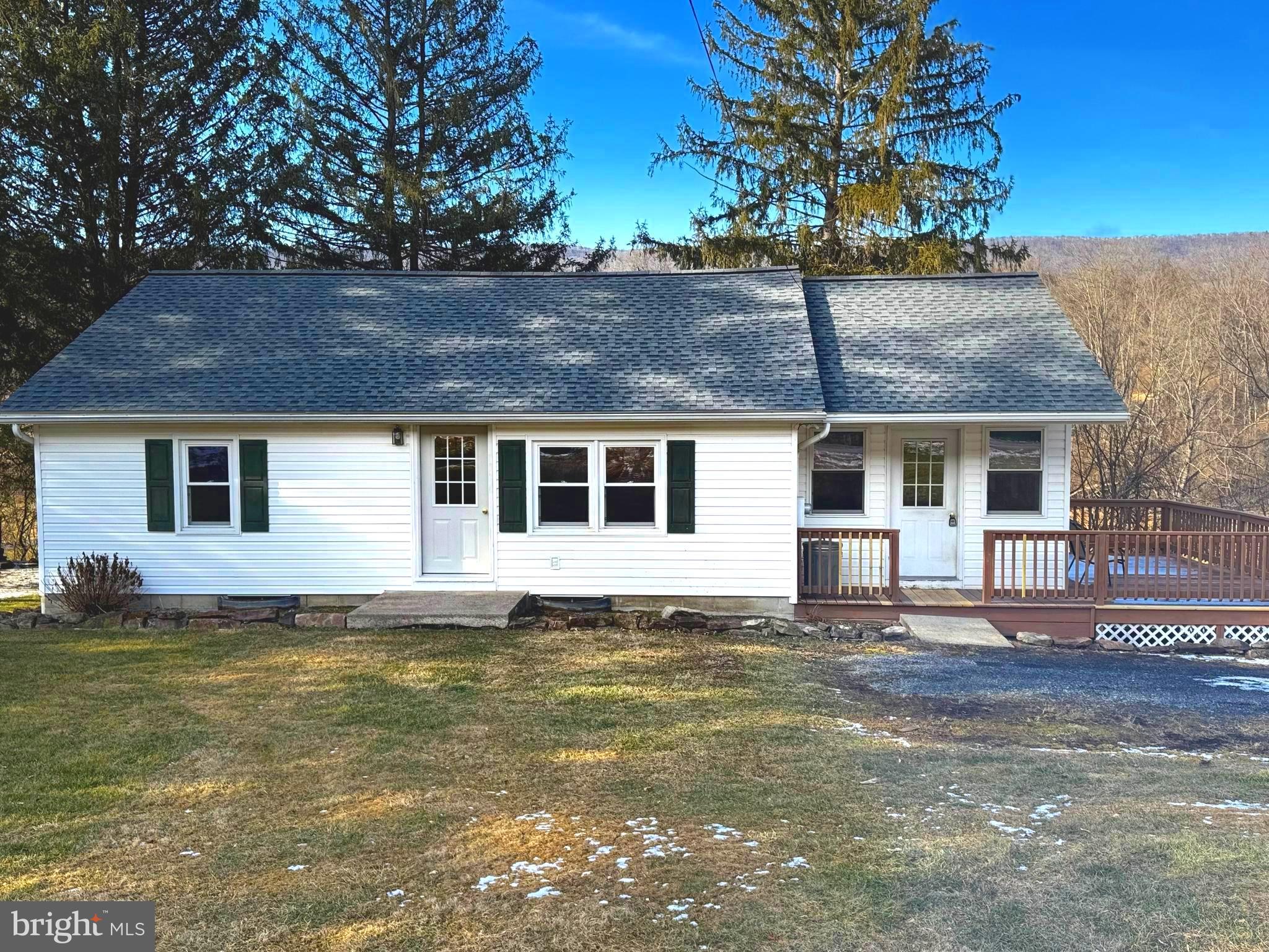 Charming ranch home with endless possibilities! This 2-bedroom, 1-bath home sits on just over an acre of land, offering peaceful views of Jacks Mountain and a small stream flowing through the backyard. The partially finished basement has been used as a third bedroom but could easily become a home office, gym, or library. Recent updates include a brand-new roof installed in September 2024, new tile in the bathroom added in February 2025, and new carpet in the bedrooms and hallway installed the same time. For those who love to build, create, or collect, the massive three-story barn offers ample storage and workspace, perfect for hobbies, a workshop, or even a future studio. Plus, the attached carport and large driveway ensure plenty of parking. This home is a must-see for anyone craving country charm, space to spread out, and unlimited potential. Schedule a showing today!