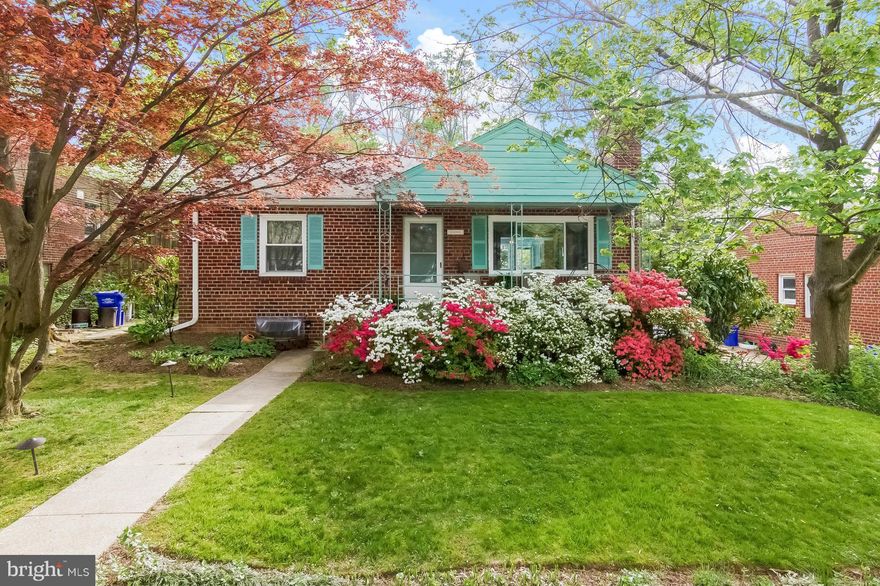 Great home-stunning kitchen picture window overlooks beautifully landscaped fenced backyard with slate patio, water feature, bench and night lighting. Gardeners delight! Hardwood on first floor, 3 baths including updated bathroom in finished basement. Lots of updates and natural light. Close to Beltway and Metro.