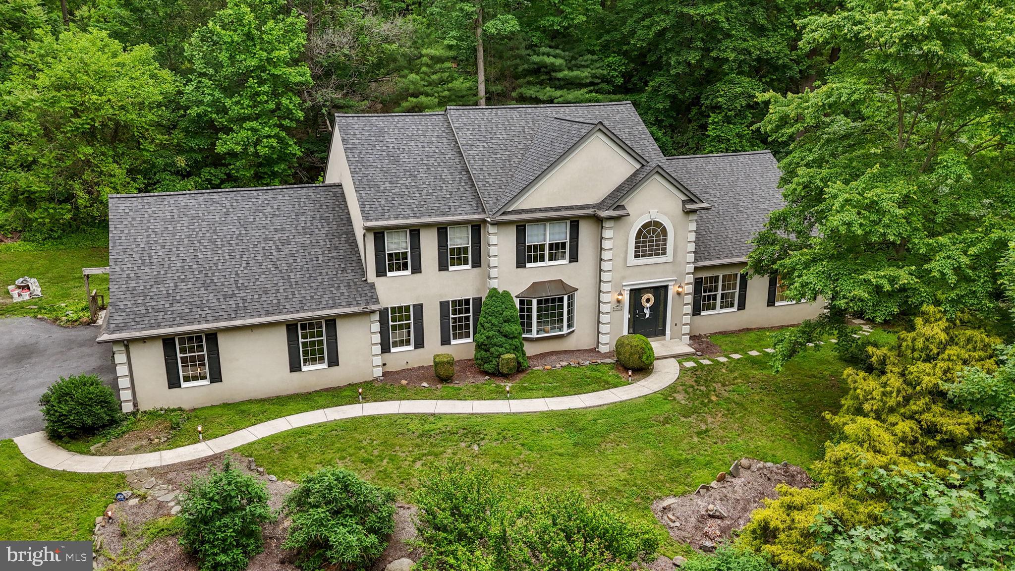 Welcome to your dream retreat—where space, luxury, and serenity come together in perfect harmony.
This stunning 4-bedroom, 2.5-bath home offers over 4,200 square feet of thoughtfully designed living space on a beautifully landscaped 2.1-acre lot in the highly regarded Owen J. Roberts School District.
Tucked away on a quiet, tree-lined cul-de-sac, the property offers ultimate privacy while still being part of a walkable, welcoming neighborhood with no through traffic—perfect for peaceful living.
Step inside to a dramatic two-story foyer that leads to the expansive great room, seamlessly connected to the kitchen and deck—ideal for both entertaining and everyday living. The open-concept layout includes a formal living room and dining room, offering flexibility for large gatherings or quiet nights at home.
The main-level owner’s suite is your private sanctuary, complete with a spa-inspired bath featuring a jetted tub, oversized shower, and double vanity. A bright and spacious home office provides the perfect work-from-home setup, and the main-floor laundry room adds everyday convenience.
Downstairs, a partially finished basement with egress offers a large bonus room, abundant storage, and a dedicated workspace—ready to be customized into additional bedrooms, a home gym, or entertainment space.
A finished 3-car garage with a turnaround driveway provides ample parking and storage for hobbyists or car enthusiasts alike.
Located just minutes from Routes 100, 422, and 23, and a short drive to shopping, dining, and Center City (only one hour away), this home blends rural tranquility with urban accessibility.
Recent upgrades and highlights include: New roof (July 2024), New microwave and electric oven (2018), Generac 16KW whole-house generator with dual 100-gallon propane tanks (2017)
This exceptional home was designed for both relaxation and entertaining—inside and out. Don't miss your chance to make it yours. Schedule your private tour today!