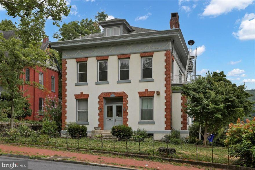 Nestled on a corner lot, this captivating 4-unit property exudes timeless charm. Original woodwork graces the interiors, creating an inviting atmosphere. The building boasts an array of amenities, including a spacious 6-car parking lot—a rare find in the neighborhood. Step into the front and back yards, where a tranquil fountain adds a touch of elegance. Each unit is thoughtfully equipped with its own washer and dryer, ensuring convenience for residents. Heating options include electric baseboards and oil heat, while window unit air conditioning keeps summers comfortable. The curb appeal is simply stunning, making this property a standout in the market.
Don’t miss the opportunity to own this gem—schedule a viewing today!