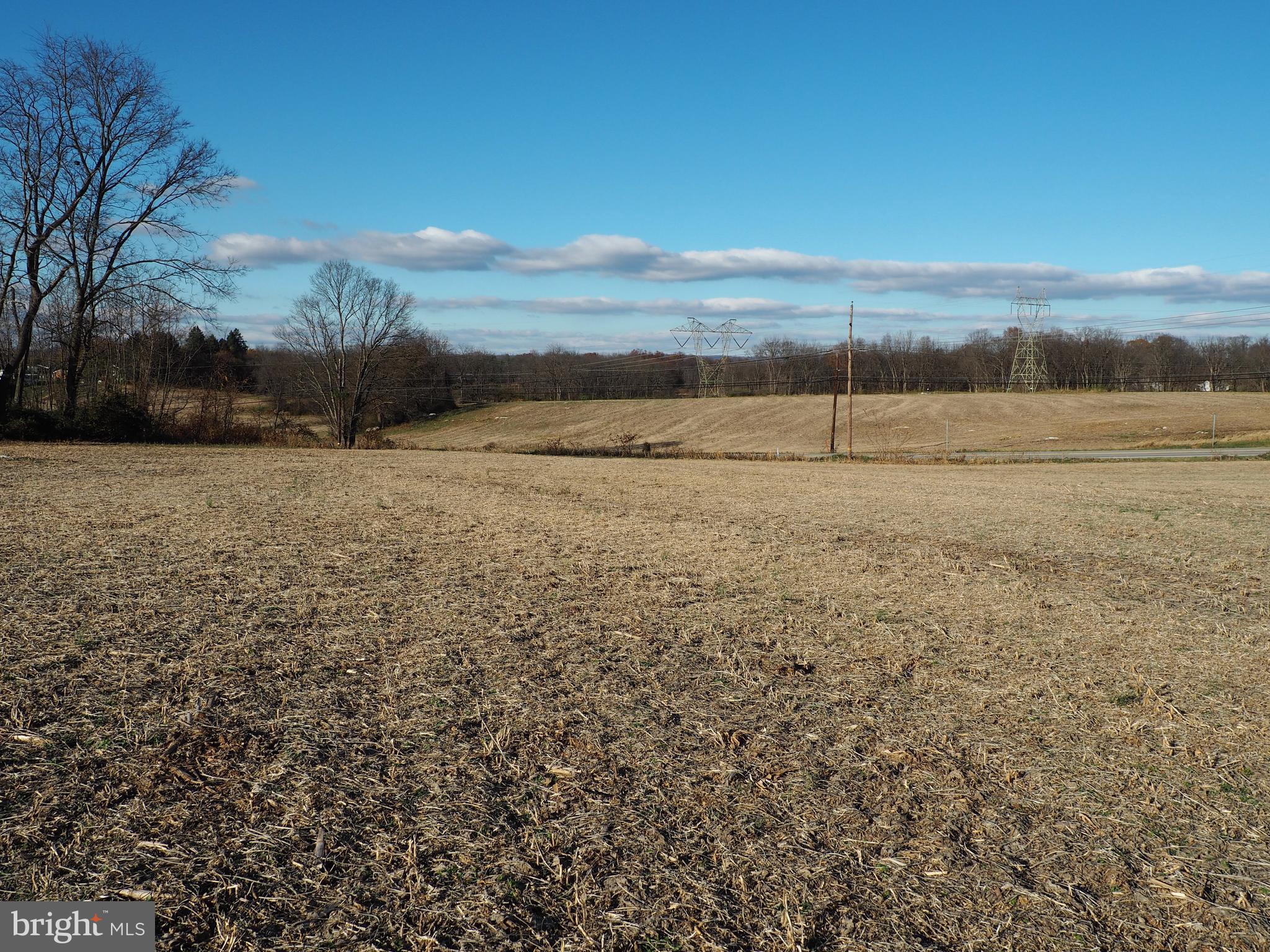 Residential building lot for sale in Monroe Township, Cumberland Valley School District. Lot 7 of Stonehouse Crossing is 2 acres and is elevated a bit from the road. The zoning is Agricultural. The lot is perc approved. Building restrictions are being developed, but not finalized yet. Bring your own builder, build anytime. Lots 5, 6 & 7 will share a driveway.