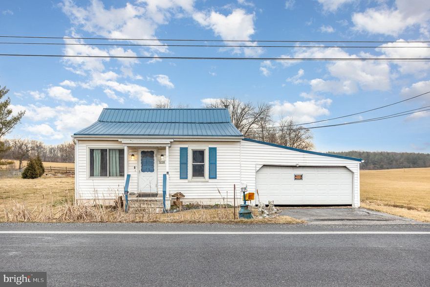 Huge price improvement! 2-bedroom, 1-bath rancher in the Littlestown School District offers single-level living on over half an acre of land. Recent upgrades include windows, furnace, and central A/C unit, ensuring modern comfort and energy efficiency.  Conveniently located near schools, shopping, and local amenities, this home  just needs a little TLC and will be ready for its new owners!