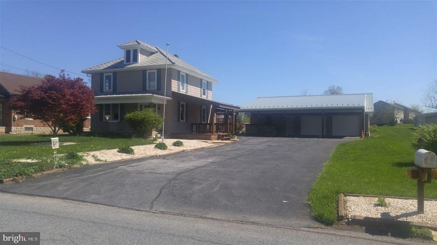 Nice traditional home in Fredericksburg located directly across from Lions Park & the Community Pool.  4 BR and 2 full BA with laundry on 1st floor. Large 2+ garage w/ 2nd story for storage & huge finished room on the side w/ heat & ceiling fans.  Enjoy the summer evenings sitting on the patio underneath the pergola & cool off in the above ground pool! Sit at the custom outdoor bar & enjoy watching the baseball games. There is a pad beside the pool with 60 Amp service waiting for a hot tub! USDA available.
