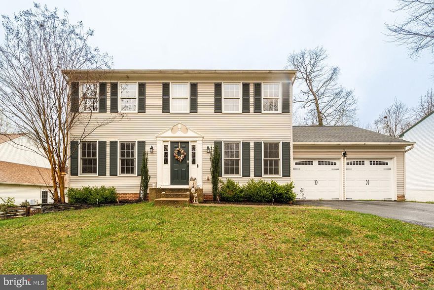 Welcome to this gorgeous 5-bedroom, 3.5-bath colonial home in sought after Cardinal Forest. Enjoy the private serenity offered by this home which is located on a quiet cul de sac and  backs to wooded wetlands.  Prepare to be impressed with the home’s comprehensive array of updates, including a brand-new spa master bathroom with gorgeous free standing soaking tub,  updated gourmet kitchen, fresh paint throughout  to create a welcoming ambiance, and stylish custom decor throughout. The kitchen is equipped with high-quality stainless steel appliances, complemented by a stylish island that offers both additional workspace and seating. Enhanced lighting fixtures and a tasteful backsplash will add to the kitchen's appeal. The home also features a fully finished lower level, complete with three rooms, a full bath, and a laundry area, providing ample space for various uses. Outside, the rear deck presents a serene view of the wooded backyard, offering a perfect setting for relaxation and entertainment. The property includes a convenient 2-car garage equipped with garage door openers, making this home a beautiful and practical choice for discerning buyers.