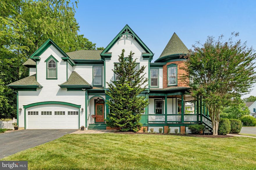 Rare opportunity to own this immaculately presented iconic custom Bukont home ideally located in a quiet cul de sac so close to the W&OD trail and Vienna town center.  Beautiful and spacious inside and out, this unique property consists of a character-filled interior and a beautiful fenced backyard with a patio and a covered wrap-around front porch.  The many features of this light-filled Vienna home are ideal for both large scale entertaining and comfortable family living. 
What a special place to call home! This well-loved home has been updated throughout including newer two-zone HVAC’s, newer water heater, paint (2023), carpet (2023), and new garage door and motor (2023).  You’ll notice the attention to detail immediately as you enter through the welcoming front porch featuring  tongue and groove ceilings and two fans.  Upon entering the home, attention is drawn to the hardwoods, inviting foyer, and decorative molding in the adjacent dining room.  The “tucked -away” living room is a great retreat for both owners and guests alike.  The main level features 10 ft ceilings and windows that bring in an abundance of natural light. The chef’s kitchen clad with finishes including a Wolf oven and gas range and a Subzero refrigerator, an island, custom inset Crown Point cabinetry, granite countertops and an eat-in area is the heart of this home. The adjacent family room features a gas fireplace flanked by windows and a door to the patio for easy flow. A mud room with built-in lockers, powder room with beadboard wainscoting, butler’s pantry and walk-in pantry complete this space.  

The second floor features access to the unique ‘turret’ room with round walls. An expansive owner’s suite is privately positioned.  Its en-suite bathroom with separate vanities, soaking tub, large shower, double walk-in closets and sitting area make it the ideal place for relaxing. This level further includes a large bedroom suite with an en-suite bathroom and two additional well-proportioned bedrooms that share a bathroom.  The tower room can be used as an additional bedroom, light filled office or playroom.  The convenient bedroom level laundry room has central hall access.

The walk-up lower level provides an impressive family space with a sizable rec room/media room that is a movie-lovers paradise and features an additional flex space with a walk-in closet perfect for an additional office, exercise space or guest area. This level also features a full bathroom and a large unfinished area with an abundance of storage. 

Seamlessly blend indoor/outdoor living and entertain in style on this private patio with a fenced in yard.  Perfect for a big crowd or an intimate gathering featuring extensive hardscaping and grilling and dining areas.

This home is ideally positioned near the W&OD trail,  and provides a peaceful atmosphere as well as premium living convenience.  Adahi dead ends into an entrance to the W&OD trail.  The neighborhood is only minutes to the heart of Vienna, I-66, the Vienna Metro Station and Tysons.  Located in the Madison High School Pyramid.  Don’t wait…this notable custom home will not last long.