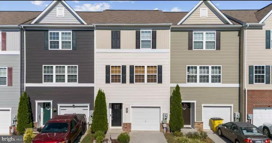 Welcome home to this beautifully maintained 3-bedroom, 2.5-bath townhome in the desirable Berkeley Ridge community of Martinsburg! The first-floor bonus room with a half bath offers flexible space—perfect for a 4th bedroom, office, or recreation area. The open-concept main level features a bright living area and a modern kitchen with stainless steel appliances, a breakfast bar, and ample cabinet space. Upstairs, the primary suite includes a walk-in closet and private bath, while two additional bedrooms share a full hall bath. Enjoy the community playground and a convenient location near I-81, shopping, dining, and schools—ideal for commuters! Washer and dryer included. Available for immediate occupancy.