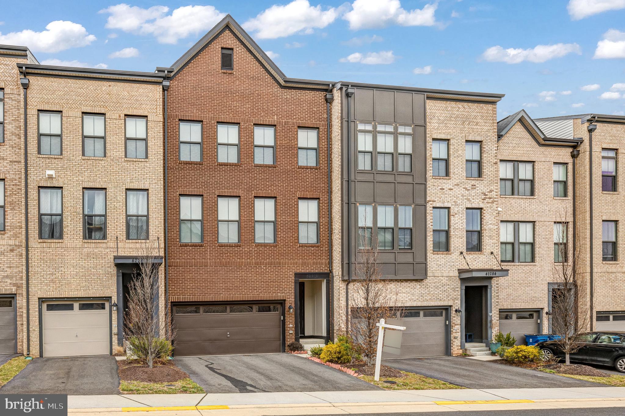 Location!!! Beautiful Van Metre Parker Model Townhome with almost 3200 sqft on 3 Levels Featuring 3 Bedroom, 3.5 Bath, 2-Car Garage , Light-filled, Open spaces and Upscale finishes, High quality Upgrades, with a Gourmet Kitchen on the Main Level featuring Stainless Steel Appliances including a Built in Microwave, Wall Oven, Refrigerator Completed with a Large Island housing the Dishwasher, Disposer & the Sink with entry to an Amazing Deck.. One of the country's best planned communities Brambleton! Walking distance to the Brambleton Town Center with Fox Movie Theaters, A Huge Library, Harris-Teeter & Many Restaurants with Multiple cuisines. .. .Access to Six Club Houses along with Internet & Cable Television is Included in Rent.