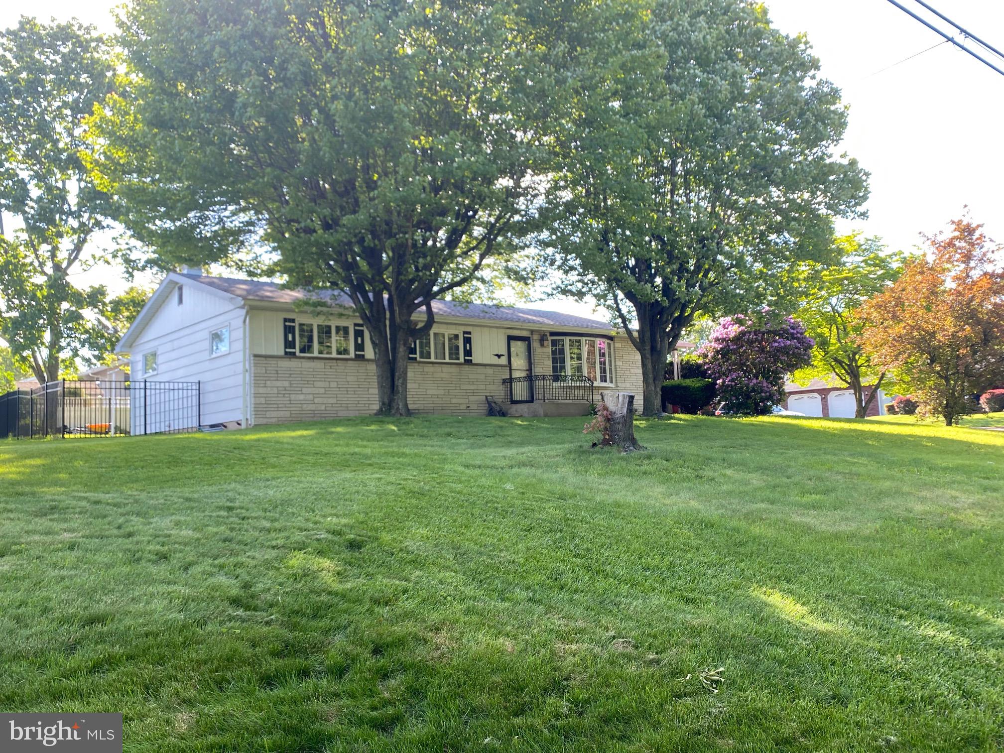 Well maintained ranch home in Woodland Acres. Nice sized rooms, featuring a newly renovated bathroom, wood floors, built-in air conditioner, stove top, oven, dishwasher, carport, and driveway for off street parking. Full unfinished basement with an additional bathroom, and laundry. Call today for a private tour.