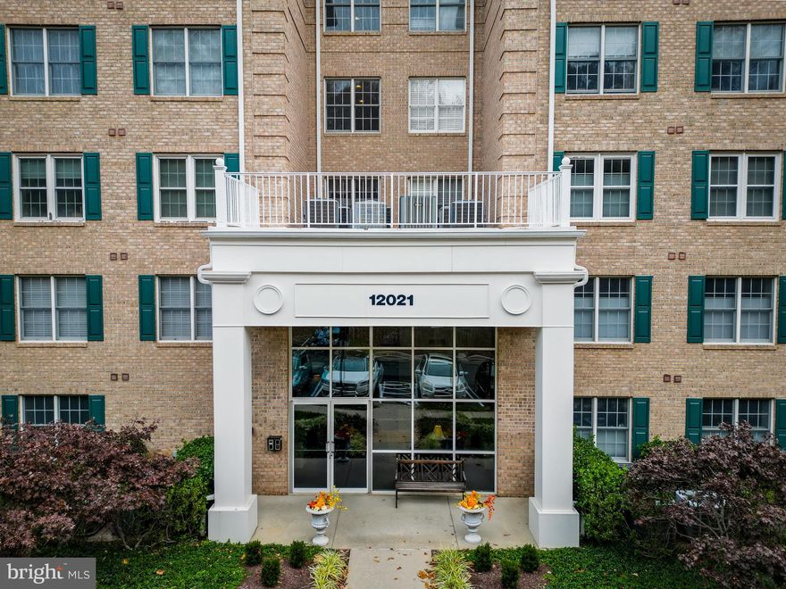 Spacious 3BR/2BA One-Level Living with Private Balcony & Elevator Access
Enjoy easy one-level living in this beautifully maintained 3-bedroom, 2-bath home featuring keypad access at the main entry and a cozy main lobby with elevator for added convenience. Inside, the unit welcomes you with an elegant entry foyer accented with dental crown molding and hardwood floors throughout most of the living areas. The dining room features a classic chandelier, perfect for hosting gatherings. The primary bedroom offers a comfortable retreat with a walk-in closet and private en-suite bath. The spacious eat-in kitchen boasts an upgraded countertop, white appliance package, and French doors leading to a private balcony ideal for morning coffee or relaxing outdoors. Additional highlights include a convenient laundry room, a bright living room with a cozy gas fireplace, and tasteful crown molding throughout. This home blends comfort, accessibility, and classic style perfect for low-maintenance living. This is an Estate Sale.