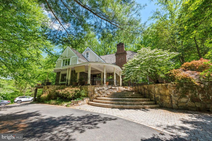 Explore this radiant and inviting home located in the distinguished River Oaks neighborhood of McLean, set on a serene cul-de-sac with park-like surroundings. This grand residence offers an impressive layout featuring 8 bedrooms, 7 bathrooms, a 2-car garage, and an elegant circular driveway. Standout features include a walkout basement and a deck that provide secluded, scenic vistas.

Ready for your personal enhancements, this property represents a unique opportunity in an elite community where homes typically range from $3 to $10 million. Experience a perfect harmony of sophistication and potential.

The main level showcases a vast living room, kitchen, dining room, and office, complemented by 20-foot ceilings and expansive windows in the great room that draw in abundant natural light. It also includes a charming lounge area with terrace access and an office that opens onto the deck.

On the upper level, indulge in the luxury of a spacious primary suite equipped with a skylight. Just above the foyer, there is a secluded bedroom suite with its own bathroom, ideal for guests or family members. The lower level hosts a considerable recreational space featuring a cozy wood-burning fireplace and a quaint bar, perfect for hosting gatherings. Additionally, this floor houses two bedrooms, each with full bathrooms and direct access to the garage.

Embrace the unique combination of elegance, comfort, and potential in a location that connects you with the best of the area: only minutes from the 495, Tysons Corner, downtown McLean, and Washington D.C. Enjoy proximity to Scott's Run, one of Northern Virginia’s premier hiking destinations, conveniently within walking distance. This property is being sold As-is.