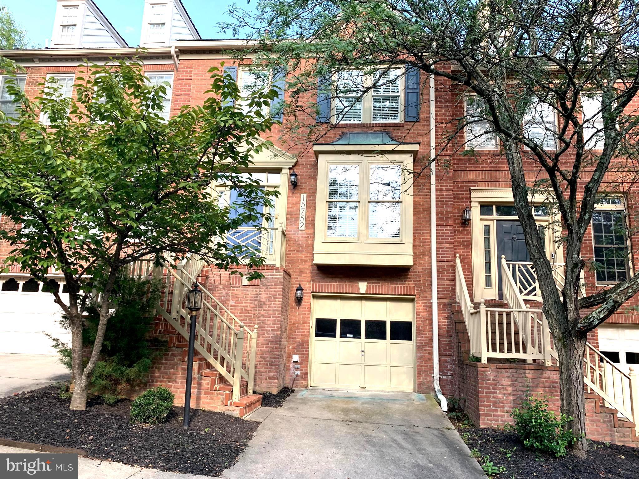 Beautiful brick front townhouse with spacious, bright and sunny kitchen. New kitchen Cooktop on order. PRICE REDUCED. NEW COOK TOP INSTALLED. Large open dining room and living room with 9 foot ceiling. Enjoy spacious and sunny table space kitchen. Ample size bedrooms, Jacuzzi bath, Large Deck and patio for entertaining. Three level living areas with a bathroom on all levels. One car garage. Enjoy walk-out lower level recreation room with full bath. Also, there are several available outdoor parking spaces across from the unit. Convenient to shopping and major transportation arteries. Landlord is requesting a minimum 720 credit score and minimum $120,000 annual income. Convenient to shopping and major roadways.