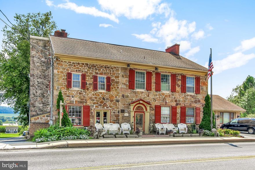 This beautiful sandstone home is on the National Register of Historic Places in the picturesque Village of Churchtown.  Known as The Hon. Edward Davies House, who purchased this property in 1804.  Edward Davies was elected to the State Legislature in 1834, and served in the Twenty-fifth and Twenty-sixth Congresses from 1839-1841.  This home is an excellent example of the early Federal period of architecture in eastern Lancaster County. It features spacious formal rooms on the main floor, with bedrooms on the second and third floor.   All bedrooms include an en suite bathroom.  There are three gas fireplaces throughout the home with original mantels.  There is tremendous flexibility with the floor plan for those looking for space to work from home. Come tour this exceptional historical property to see for yourself!