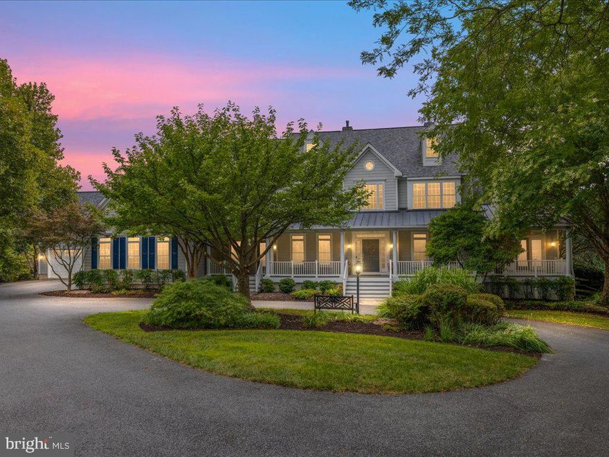 Luxurious estate home located on a quiet cul-de-sac in Brantwood perfectly blending style and function!  The circular drive and a covered front porch lead to the foyer with rich hardwood flooring that is carried through most of the main level.  The fully renovated kitchen is a chef dream with custom cabinetry, a huge island, quartz countertops, professional grade Thermador appliances, a large pantry and a sunny breakfast area.  The sunken family room off the kitchen boasts a stone fireplace with a pellet stove insert.  The formal living and dining rooms are full of decorative moldings and both feature a gas fireplace.  The sunroom with cathedral ceilings is filled with natural light and has access to both the front porch and the back deck. A convenient main level office features pocket doors, built-ins and a two sided fireplace.  A private suite with a full bath on the main level is ideal for extended family or guests. The mudroom is the perfect place for home organization and features custom cubbies and an extra washer and dryer.  Hardwood steps lead to four bedroom suites, all with attached baths and walk-in closets. The primary suite features a two-sided gas fireplace, sitting room with French doors to a private deck, a custom walk-in closet and a luxurious primary bath with jetted tub, separate vanities with granite countertops, a huge walk-in shower and two water closets.  A second laundry closet in the hall is convenient to all the bedrooms.  The 4th level features a versatile space with built-ins, a full bath and ample storage, ideal for a bedroom suite, playroom or office.  The finished, walk-out lower level is an entertainers dream.  The large rec room offers a gas fireplace, a wet bar and plenty of room for casual living and a game area.  The theatre room is the perfect spot for movie night or weekend football.  More space includes a large home gym, hobby room, workshop and sports cave, ideal for a golf simulator! Relax on the screened porch off the kitchen or the covered patio below overlooking the private back yard.  This home features an oversized garage for six cars along with a lower garage for hobbies and plenty of storage. Peace of mind comes with great mechanical updates including a new architectural roof in 2019, Hardi plank siding, multi-zone geothermal HVAC, natural gas generator, owned water treatment systems and other convenience and tech upgrades throughout.  This is truly a one of a kind luxury home in Ellicott City!