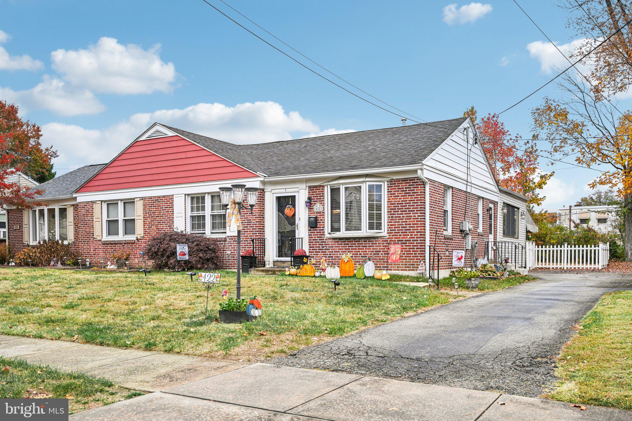 What a gem for the first time buyer or looking to downsize!
Welcome to this lovely brick twin rancher, perfectly situated in the vibrant and highly sought after community of Holmes Boro, Ridley Township. This home is perfect for a first time home buyer or buyers looking to downsize with plenty of attic storage and a large yard with the ability to add an additional shed for even more storage. Once inside, you'll discover an inviting open concept floor plan, bathed in natural light and showcasing gleaming hardwood floors, recessed lighting, and elegant crown molding, all complemented by ceiling fans for added comfort. The spacious living room, featuring a decorative fireplace, seamlessly flows into the kitchen, which is equipped with laminate countertops, a gas convection range with five burners, and generous cabinet and counter space—ideal for both cooking and entertaining. A fantastic addition off the kitchen expands the living area into a bright dining room, surrounded by three walls of windows, creating an airy atmosphere that enhances your dining experience. On the opposite side of the home, you’ll find two cozy bedrooms, thoughtfully separated from the main living areas for added privacy, along with a full hall bathroom. The convenience of a stackable laundry unit on the main level makes chores a breeze. Access outside from the dining room to your fully fenced backyard oasis, complete with a large patio and awning—perfect for summer barbecues and outdoor relaxation. The home features a shared driveway with parking and tons of storage including the full size attic accessible by pull down stairs. Notable updates include all new windows (2005), updated electrical (2005), HVAC system (2014), and siding (2005), ensuring peace of mind for years to come. The property is equipped with two sump pumps, while the water heater and heater are conveniently located in the attic. Enjoy the close proximity to local playgrounds, parks, and the YMCA, making this home an ideal choice for those seeking both comfort and community. Don’t miss the opportunity to make this charming rancher your own!.