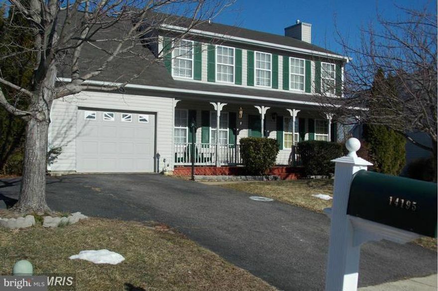 BRAND NEW HEATING & A/C UNIT INSTALLED IN AUGUST 2014. Beautiful renovated home with fenced in back yard and 2 level deck. SS appliances, granite counters, cherry cabinets, hardwood throughout man in level and stairs, crown molding, chair rail, new carpet . Luxury Mstr. Bdrm Suite with large sitting rm. Additional room in LL for office or 4th bdrm.