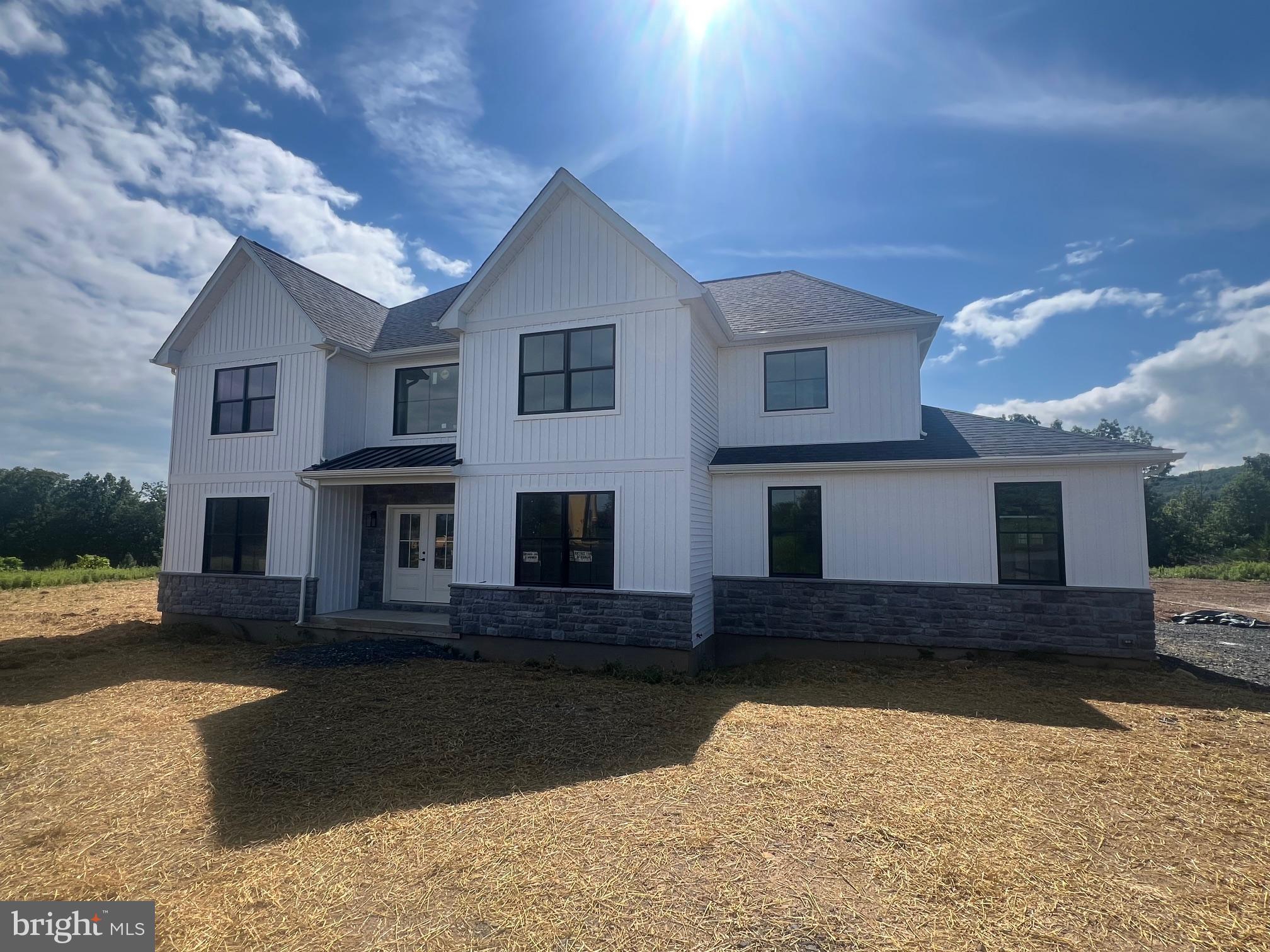 Open House - Sat. Aug 9th 12pm-3pm. Quick delivery home now available - Beautiful Fairview Farmhouse spec home for sale! Tons of upgrades throughout! Welcome to Sage Meadows, a scenic 10 lot subdivision in Mahoning Township. A stunning & spacious option, this home balances modern finishes w/ traditional charm across a sprawling 3,000 plus sq. ft. floorplan on 1.4 acres. You’ll find plenty of room for entertaining or relaxing, w/ formal & casual living & dining spaces & custom kitchen. Beautiful 42-inch cabinets, upgraded appliances including wall oven/microwave, cooktop, farm sink, upgraded granite or quartz counters & subway tile backsplash. A grand staircase leads you up to the 4 bedrooms, each spacious w/large walk-in closets & primary suite boasting a custom tiled shower. Lifeproof laminate floors throughout (exc. bedrooms). Many add'l upgrades including Black Pella windows w/wood clad interior, propane fireplace, barn doors, dual central cooling/heating and more! Located under 3 miles from LVHN-Carbon, St. Lukes, & Route 443 shopping. Take a quick drive & visit charming Jim Thorpe & the Asa Packer Mansion Museum or explore nearby Blue Mountain Resort offering year-round hospitality & stunning views. Sit back at a local winery or at Penn’s Peak for live music or have an active day skiing, swimming, boating or fishing. Enjoy easy access to Route 209, Rt 248 & PA Turnpike Rt 476, all under 6 miles. Easy commute to Allentown, Philadelphia, NJ & NY. This beautiful setting blends modern conveniences w/easy access to endless amenities. Call today!