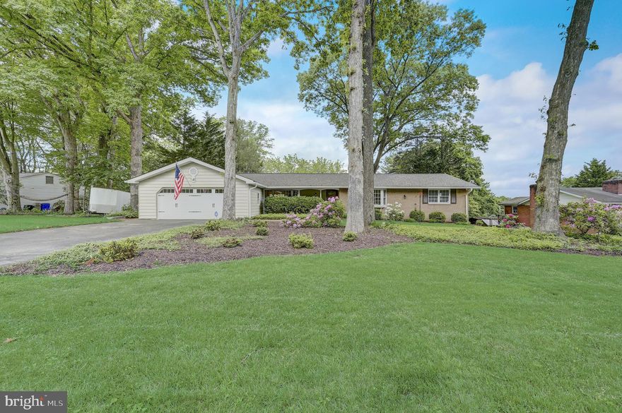 Welcome to 9032 Overhill Dr! This property sits on a 0.47-acre lot. The home spans a generous 3,116 square feet, offering ample space for family living and entertaining guests. It features two spacious areas: a family room with a brick surround fireplace and bay window, as well as a spacious living room that opens to the dining room. The eat-in kitchen leads to the gorgeous, enclosed sunroom overlooking the pool and spacious yard. 

This home boasts three bedrooms and two full bathrooms  on the main floor and half bath in the lower level, with the primary bedroom featuring an ensuite bathroom. The layout is comfortable and functional, and the finished basement provides extra space for recreation, your own home gym, or storage. The lower-level walks out to the backyard, providing a private oasis for outdoor enjoyment. It’s the perfect spot for summer barbecues or simply unwinding in the pool with friends and family.  

Recent updates include fresh paint, new circuit breakers, hot water heater, new boiler, new hardwood floors, new gas fireplace, HVAC (2017), basement has been updated, roof (2023)-(50 yr Warranty Allied certificate ). This home also has a 10kw gas generator that will power half of the house.  

 Don’t miss the opportunity to make this home your own! Schedule your tour today!