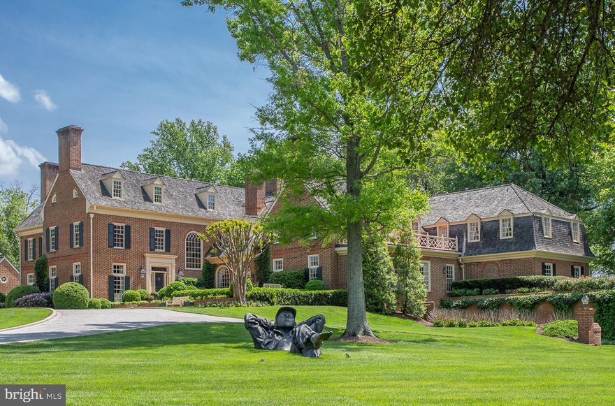 A unique offering of a magnificent, gated estate on SIX acres in the exclusive Round Hill Neighborhood. The all brick, main house features four finished levels, with seven en suite bedrooms. The lower level is a car lover's dream, with a side garage entrance to showcase your prize possessions! The pool house, featuring a kitchenette and full bath, sits on an impeccably landscaped two acre lot alongside the main home.  Walk down to the second two acre parcel that offers a two bedroom guest home and lighted tennis court.  The third two acre parcel is a lush green, flat and cleared piece of land that is buildable and already has septic approved by the county.  Or the new owner can entertain horses, or keep the land as is  and enjoy the beautiful view!  Great value in this six acre property with three separate structures!
**THIS SALE INCLUDES LOT 87, 89 AND P86.   TAX INFO LISTED FOR THIS PROPERTY ONLY DISPLAYS INFO FOR LOT 87 (MAIN  HOUSE/POOL HOUSE).