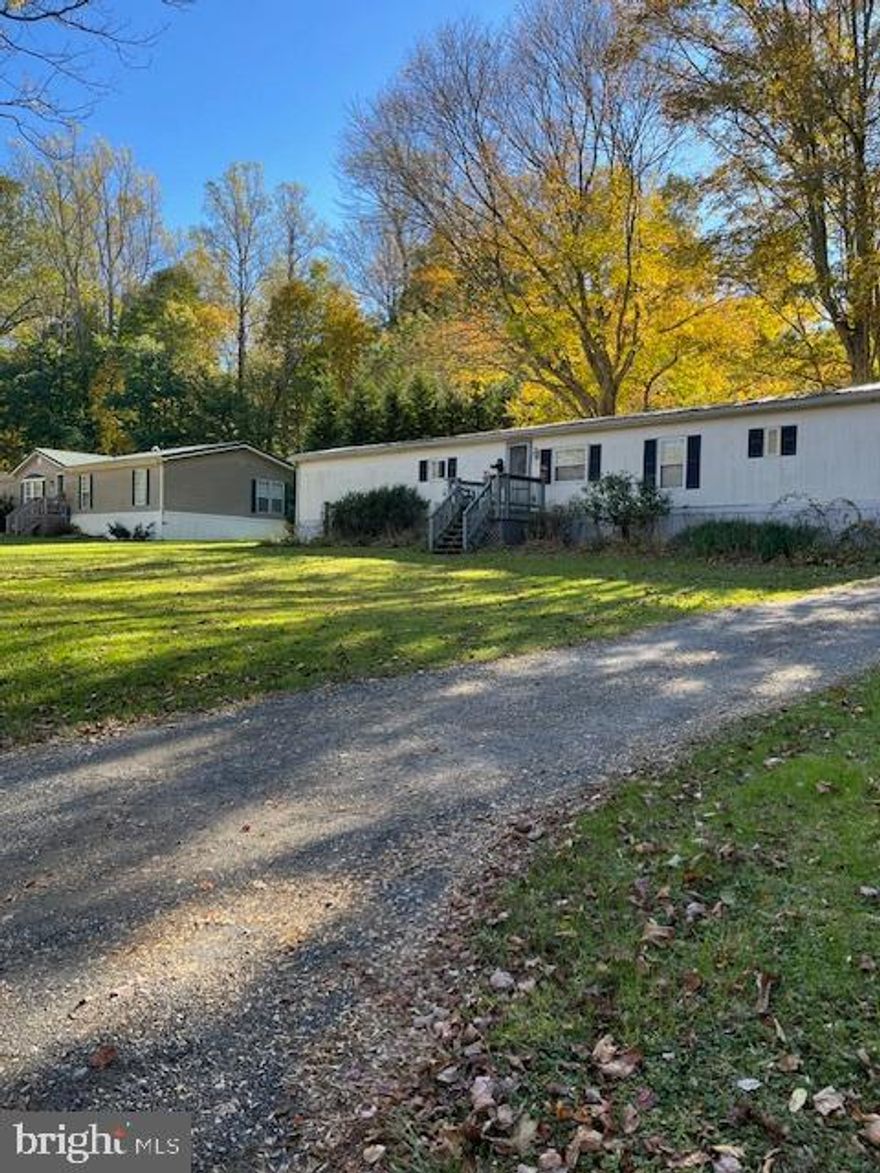 2 single family lots being sold together as one 14.61 acre  parcel. Lot 1 contains 4.41 acres, lot 2 is 9.195 acres.   Currently has 2 tenant occupied mobile homes in place with 1 well and 2 septic, approx. $2500 /mo. income. See documents for PP approval and items needed for final plat approval of the 2 lots.  No AG-Transfer tax due . No impact fee due to 2 existing dwellings that are to be removed, electric service in place (approx. $30,000 savings compared to other lots).  No builder tie-in. No mobiles or double-wide. Restrictions are negotiable. No storm water mgt. plan needed. Buyer to drill wells and complete  Preliminary Plan Approval conditions.