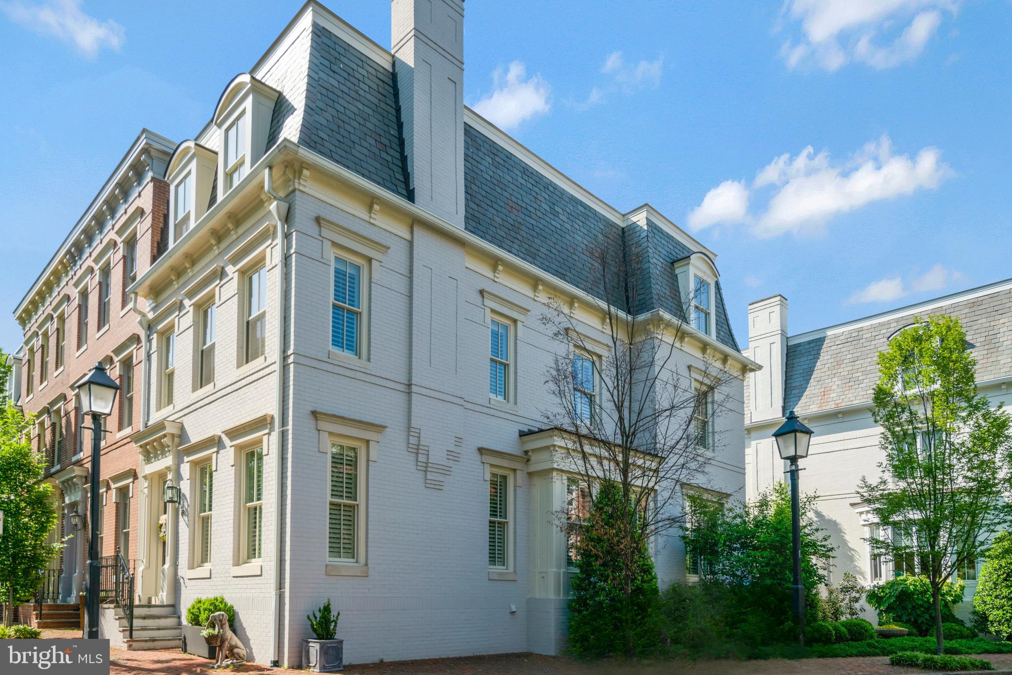 Welcome to the epitome of luxury living in the esteemed Backyard Boats community, nestled within the southeast quadrant of historic Old Town Alexandria overlooking lush parkland greenery and the picturesque Mt. Vernon Trail. This prestigious end unit residence, built in 2002, boasts an iconic mansard roof and represents the pinnacle of sophistication, offering the largest model in the neighborhood with 3,182 square feet of living space and unparalleled amenities.
Upon arrival, experience the utmost convenience with a private two-car garage, accessible through a secure gate, providing both security and peace of mind. As an added bonus, the garage is equipped with an electric vehicle charger, catering to the needs of environmentally conscious homeowners.
Step inside to discover a meticulously maintained interior, where every detail has been carefully curated to create a sense of luxury and comfort. The spacious open floor plan flows seamlessly from one room to the next, with ample natural light illuminating the living spaces. The gourmet kitchen serves as the heart of the home, featuring top-of-the-line appliances, quartz countertops, and custom cabinetry.
Adjacent to the kitchen, a flagstone patio awaits, offering a serene outdoor retreat perfect for al fresco dining or relaxing on warm summer evenings. This exceptional residence also offers the rare opportunity to install an elevator, providing convenient access to all four levels of the home. Whether you're hosting guests on the upper levels or simply looking to move between floors with ease, the option for an elevator adds an extra layer of luxury and convenience.
Convenience is paramount with this property, as it is situated on a private street with little through traffic, ensuring peace and tranquility. Additionally, enjoy the proximity to the charming shops and renowned restaurants of Old Town, as well as an easy commute to Washington, D.C., and convenient access to the airport and metro.