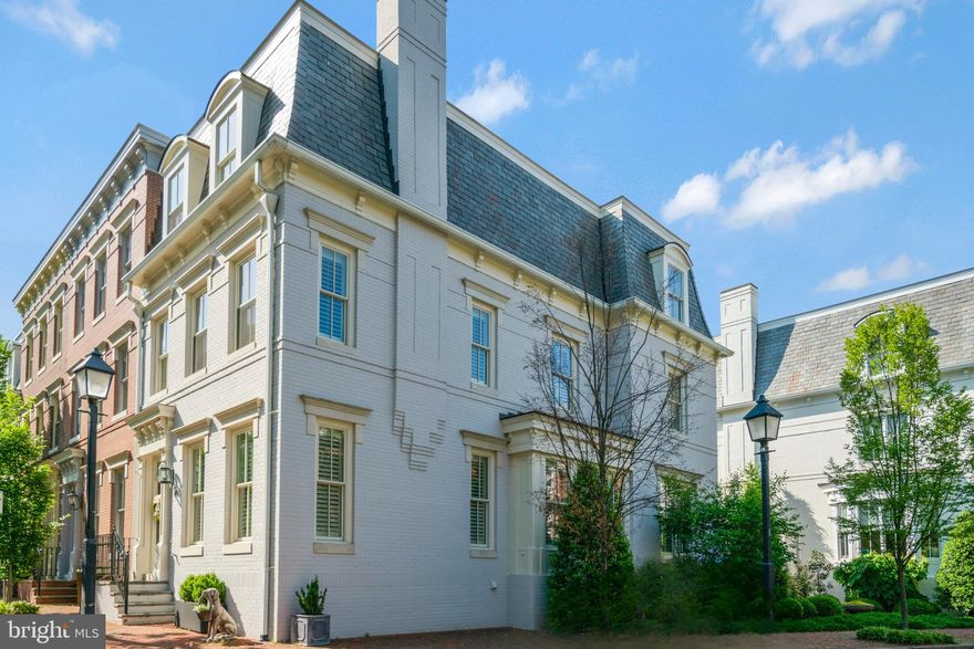 Welcome to the epitome of luxury living in the esteemed Backyard Boats community, nestled within the southeast quadrant of historic Old Town Alexandria overlooking lush parkland greenery and the picturesque Mt. Vernon Trail. This prestigious end unit residence, built in 2002, boasts an iconic mansard roof and represents the pinnacle of sophistication, offering the largest model in the neighborhood with 3,182 square feet of living space and unparalleled amenities.

Upon arrival, experience the utmost convenience with a private two-car garage, accessible through a secure gate, providing both security and peace of mind. As an added bonus, the garage is equipped with an electric vehicle charger, catering to the needs of environmentally conscious homeowners.

Step inside to discover a meticulously maintained interior, where every detail has been carefully curated to create a sense of luxury and comfort. The spacious open floor plan flows seamlessly from one room to the next, with ample natural light illuminating the living spaces. The gourmet kitchen serves as the heart of the home, featuring top-of-the-line appliances, quartz countertops, and custom cabinetry.

Adjacent to the kitchen, a flagstone patio awaits, offering a serene outdoor retreat perfect for al fresco dining or relaxing on warm summer evenings. This exceptional residence also offers the rare opportunity to install an elevator, providing convenient access to all four levels of the home. Whether you're hosting guests on the upper levels or simply looking to move between floors with ease, the option for an elevator adds an extra layer of luxury and convenience.

Convenience is paramount with this property, as it is situated on a private street with little through traffic, ensuring peace and tranquility. Additionally, enjoy the proximity to the charming shops and renowned restaurants of Old Town, as well as an easy commute to Washington, D.C., and convenient access to the airport and metro.