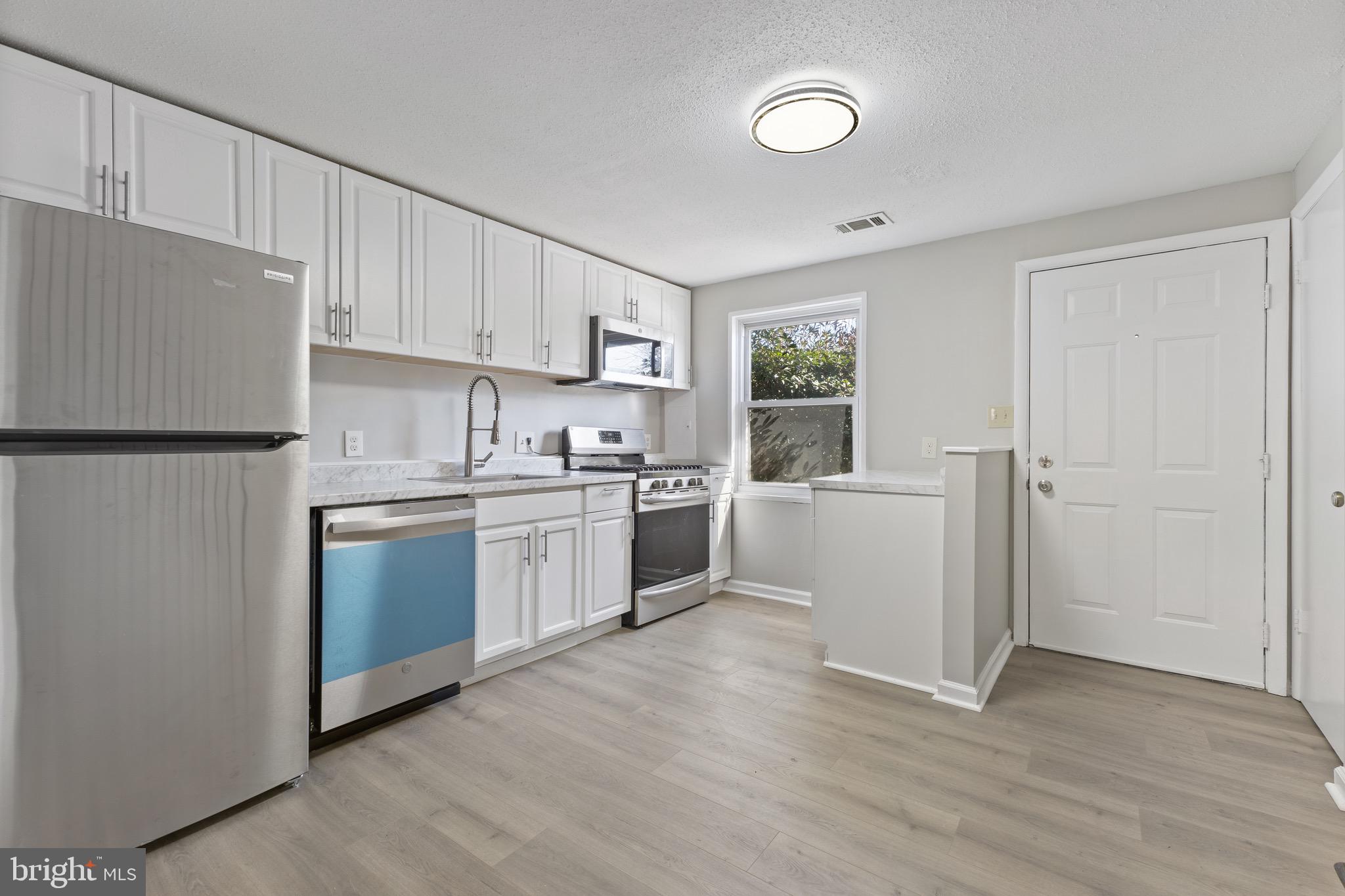 1726 VILLAGE GREEN DRIVE A-14
