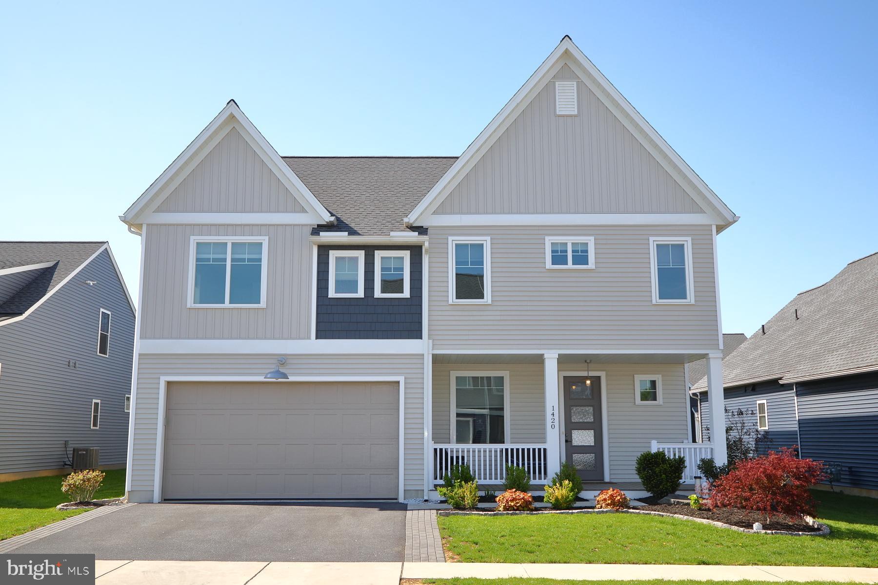 Discover this beautifully crafted 3-year-old home, nestled in the sought-after community of The Gables at Elm Tree. Thoughtfully designed and impeccably maintained, this residence offers a perfect blend of contemporary style and everyday functionality. Step inside to an inviting open floor plan enhanced by neutral tones, recessed lighting, and durable luxury vinyl plank flooring throughout the main level. The gourmet kitchen is a chef’s dream, featuring gas cooking, stainless steel appliances, sleek quartz countertops, and a stunning granite island ideal for both meal prep and casual gatherings. Relax in the spacious living room, complete with custom built-in shelving, or step outside to the oversized rear deck. Retreat to the private main suite, a true sanctuary with double sinks and a frameless walk-in shower. Offering 4 generous bedrooms and 2.5 bathrooms and ample storage throughout. Don’t miss your chance to own this modern gem in a peaceful, established neighborhood—schedule your showing today!
