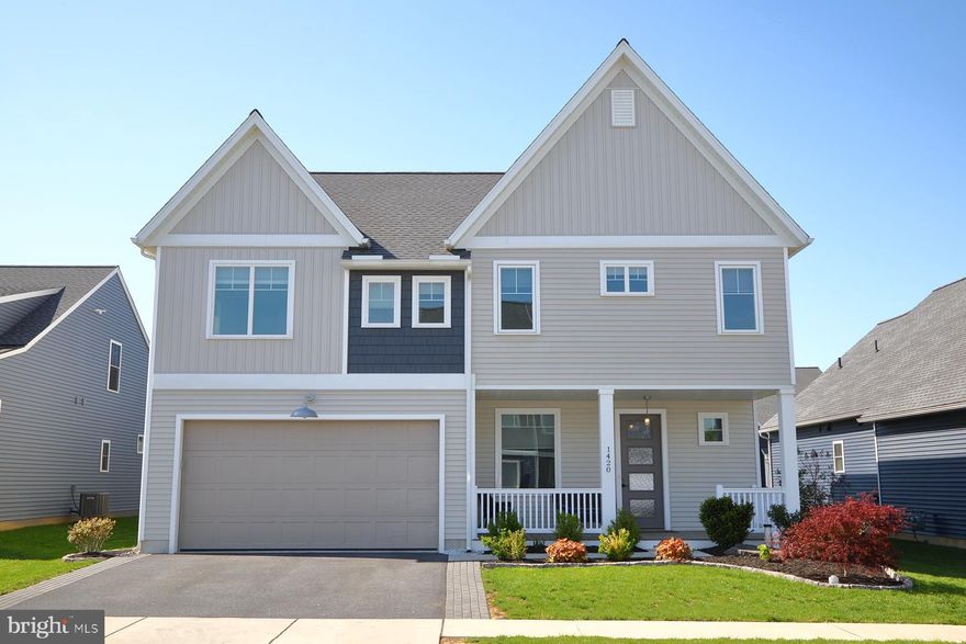 THIS HOME QUALIFIES FOR 100% FINANCING AND ZERO DOWN THROUGH USDA.   Discover this beautifully crafted 4-year-old home, nestled in the sought-after community of The Gables at Elm Tree. Thoughtfully designed and impeccably maintained, this residence offers a perfect blend of contemporary style and everyday functionality.  Step inside to an inviting open floor plan enhanced by neutral tones, recessed lighting, and durable luxury vinyl plank flooring throughout the main level. The gourmet kitchen is a chef’s dream, featuring gas cooking, stainless steel appliances, sleek quartz countertops, and a stunning granite island ideal for both meal prep and casual gatherings.  Relax in the spacious living room, complete with custom built-in shelving, or step outside to the oversized rear deck.  Retreat to the private main suite, a true sanctuary with double sinks and a frameless walk-in shower.   Offering 4 generous bedrooms and 2.5 bathrooms and ample storage throughout.  Don’t miss your chance to own this modern gem in a peaceful, established neighborhood—schedule your showing today!