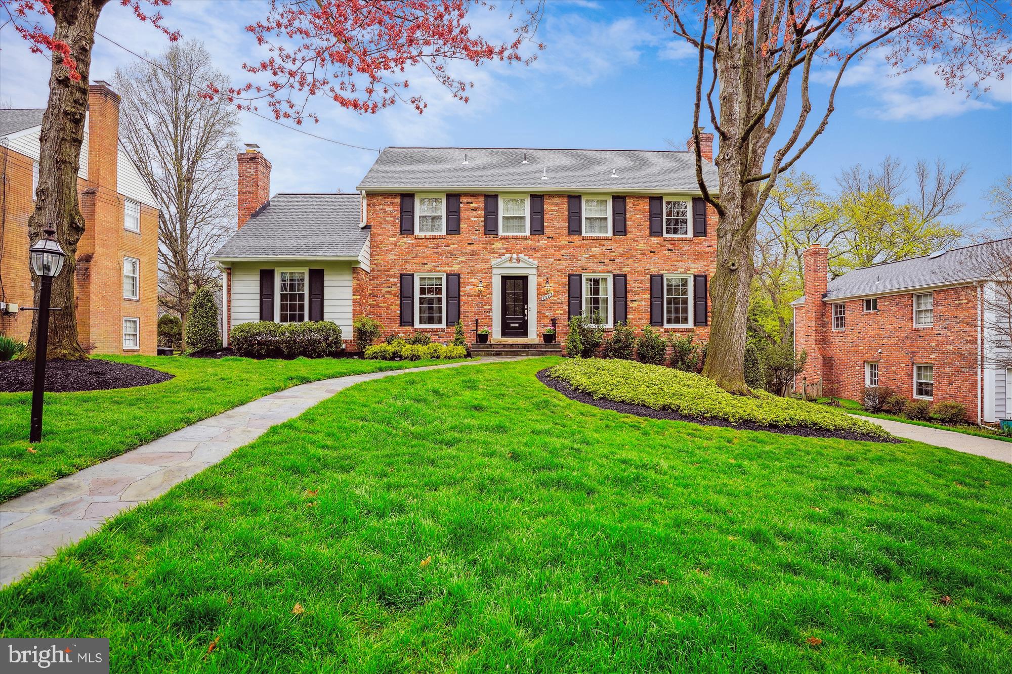 Wonderful opportunity to own this beautiful 5 bedroom, 3.5 bath brick colonial on a quiet street in the sought out neighborhood of Old Farm. Prepare to be wowed by the over abundance of light that pours through the windows in this fully renovated colonial. Home opens to large foyer with custom wood railings along staircase and offers large private office off of entrance with tons of natural light and glass french doors. Kitchen has been opened to oversized dining room and offers an abundance of creamy white cabinetry including large pantry, stainless appliances, granite countertops with counter height seating and Italian tiled backsplash. Kitchen boasts breakfast nook featuring large window overlooking beautiful backyard and access to the exterior patio with grilling nook (natural gas grill hookup) outside of kitchen door. Main level also includes large family room with custom wood built-ins and fireplace featuring gas log insert. Living room includes 2nd wood burning fireplace and offers a private space to entertain, read or unwind. Main level offers wood flooring throughout that has been recently refinished (2020) and powder room with ceramic tile flooring. Upper level does not disappoint with large primary suite featuring renovated primary bath with double sink vanity, large shower with bench and custom linen cabinet. Primary bedroom also boasts large walk-in closet with custom Elfa closet system. Three additional large bedrooms and one hall full bath that has been renovated to include double sink vanity and deep tub/shower combination with custom glass sliding shower doors. Upper level also offers newly refinished wood floors (2022) and attic/eave storage. Lower level is spacious featuring luxury vinyl plank flooring throughout and offers a ton of natural light with walk-out slider access to the backyard. Large recreation room with custom cabinet dry bar featuring wine fridge and wood storage shelf. Custom built cubbies offer storage for backpacks and coats as you enter from the oversized one car garage. Lower level includes large bedroom with egress access and two ample storage closets. Laundry room is large and also offers deep inset silgranite sink, tons of cabinet storage for pantry overflow, and access to a large finished storage room. Basement bathroom does not disappoint as it offers a large shower with custom glass doors, sink vanity and beautiful tiled flooring. The real gem of this home is the backyard which is large, private and idyllic - the perfect spot to enjoy your morning coffee, or entertain friends and family. The double paver patio is expansive, offering space for lounge seating and also table space. The yard has been meticulously manicured with a full landscaping overhaul (2022) and offers sprinkler system with new controller/backflow (2020). The driveway is concrete and long, offering the perfect play spot for a basketball hoop or bike riding. Too many updates to list: New windows (2023), Whole house energy audit/insulation (2021), Oversized gutters installed (2019), New exterior doors (2017), New vinyl exterior shutters (2017), New roof (2016). Old Farm is a wonderful community featuring two pools (membership required) and lots of community events including 4th of July parade, summer picnic and winter on the farm event. Convenient location to 270, 495 and Old Georgetown Road and close to Pike and Rose, Park Potomac, Cabin John Shopping Center, Wildwood Shopping Center, Downtown Bethesda and so much more.