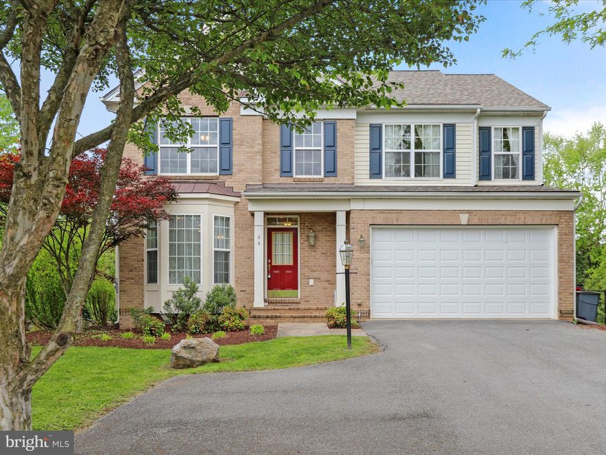 Safe end of the Cul-De-Sac location minutes and walkable to Morgan's Grove Park and the NEW Shepherdstown Library and just a short bike or drive to downtown Shepherdstown and Shepherd University, this Colonial Hills Home is just perfect in so many ways.  Home has fresh carpet installed May 2025, newer appliances, gleaming hardwood floors, an incredible plant loving sunroom, stone fireplace, and so much more to love.  The main floor offers a very flexible living arrangements that can be set up a multitude of ways.  Your imagination is your only limitation.  Upstairs, all bedrooms are very large and the primary features vaulted ceilings, a large primary bath, and walk in closet.  One of the secondary bedrooms has an awesome built in closet space that can be used traditionally or as an office.  The walk out basement features plenty of space for your rec room and previously was used as a bedroom, a multi purpose room, and storage.  The roof dates 2021, and some other features of the home include 9' ceilings throughout main level, whirlpool tub in primary bath, crown molding, and central vacuum.  Head out back and enjoy your VERY private back yard patio under the pergola draped in flowering hydrangea, and hang out in one of the largest yards in the community.  You own everything below the wall in the fenced area as well as the space the current owners keep a bit more wild above the stone wall as well.  There is even a pet ramp out the little pet door in the laundry room for your older (or younger) pets to use.  The yard is nicely landscaped with mature planting and decorative mulch beds.