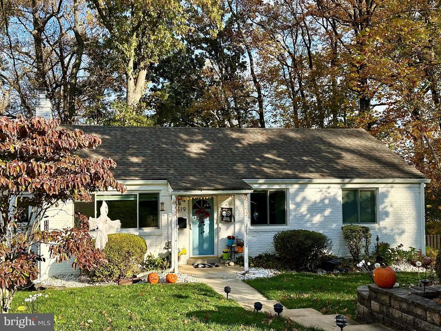 This charming storybook-style home in popular Falls Church backs to mature trees providing privacy, natural beauty and a peaceful environment.  Complimenting this home are modern high end features including a Subzero Refrigerator/Freezer, a 6 burner Wolf range and high end cabinetry.  Marble countertops, LED under cabinet lighting, a recessed pot hanger make this home a real chef's delight.  The added-on dining area with bay window accommodates seating for 8 PLUS the kitchen peninsula provides seating  for 4 and enhances the overall appeal of this home!!!!  There's a surprising amount of storage.   Too many features to list here!!!!  A must see!!!!

Peaceful family room off kitchen with pass thru.  Which leads to a unique, high quality well built screened-in porch perfect for family entertainment and relaxation OR sipping a cup of coffee while admiring the flowers and birds in your secluded wooded back yard.

Timeless hardwood flooring and a picturesque FP in the living room.  This home includes a primary bedroom with full bathroom, another full bath on the first level, and a fully finished lower level bedroom suite with a cozy seating area and full bath.  This home is ready to make new memories.

The square footage of this home is quite large.  Additions have been added over the years.  Square footage may not be exact and should be verified.  Come see this home that's loaded with space and charm!!!!

Here is a list of some of the upgrades the owners have made over the years:
1.  Total kitchen remodel.  New kitchen appliances and downstairs bathroom remodel.  $146K.  August 2014.
2.  Screen porch and deck build 192 sq ft - $28.4K.  September 2007.
3.  Replace sliding glass doors in both family room and primary bedroom & windows in family room with extreme 2 pane glass.  $14.4.  June 2019.
4.  New roof-September 2014. $10.2K.
5.  Carrier HVAC system - $10K. September 2017.
6.  Mitsubishi split heat/ac system in workout room. 2018.
7.  Replace windows in both bedrooms, basement & all windows in front room. $6.2K. November 2009.
8.  Attic insulation. $5.2K. August 2014.
9.  Fence back of property. $5K. $2020.
10.  Front room window shade w remote control.  $1.8K. 2019.
11.  Whirlpool washer. $800. 2021.
12.  Replaced humidifier. $300. 2021.
13.  Annual chimney maintenance/cleaning.  Most recent 12/7/2025.
14.  Maintenance and minor repairs on HVAC system & mini-split system.  Contracted for 2 times per year thru 2024.  Did not renew in 2025.
15.  Quarterly inspection and treatment services thru contract with Orkin.
AGAIN, TOO MANY FEATURES TO LIST!!!!