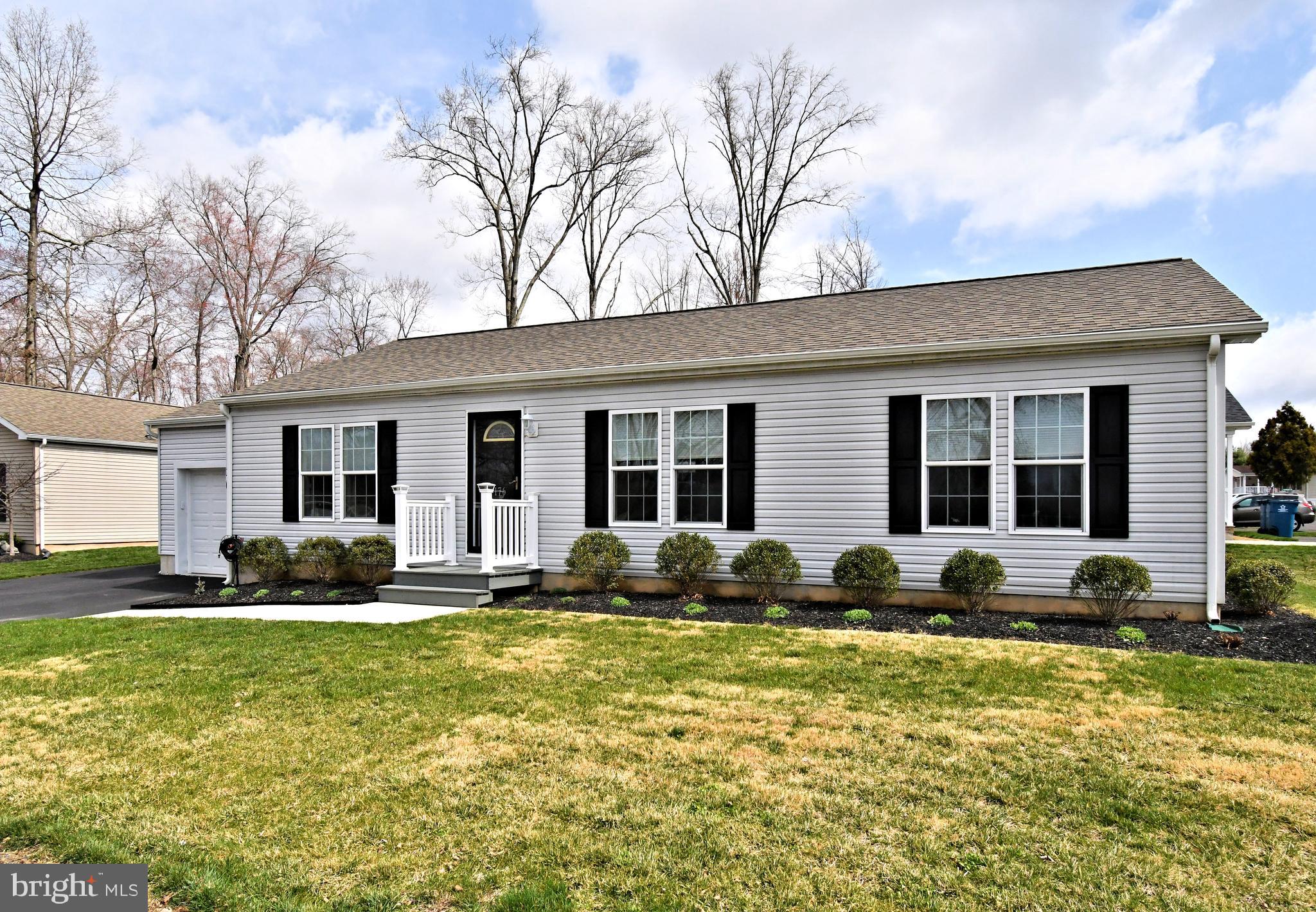 BACK ON MARKET due to unforeseen buyer circumstances -- no fault of the property. This beautiful home is now available again and priced to sell quickly. The seller is ready to move, presenting a great opportunity for new buyers to take advantage of this fantastic home at a newly reduced price. Situated minutes from vibrant downtown Doylestown you are a stone's throw away from cultural attractions, boutique shopping and dining experiences. Welcome to this updated, open concept design rancher in desirable Colonial Heritage. A modern twist on a single level. The stunning new kitchen with white/grey marble granite counter tops, white cabinetry, split island with seating for three, stylish backsplash and farm style sink make for an outstanding focal point in this open floor plan. Plenty of cabinet storage. This beautiful kitchen lends itself to an open dining area that has plenty of room to seat your family gatherings comfortably. This spectacular home with lots of natural light has 3 spacious bedrooms, including luxurious primary suite with an attached full double sink bath with large shower stall and walk in closet. Two additional bedrooms with large closets that share a full hall bath with shower tub. Enjoy ample closet space and the convenience of a separate laundry room complete with newer washer, dryer, wash tub and cabinets for extra storage. All new flooring throughout. For ease of living, you also have an attached one car garage with garage door opener and access to the inside. Step outside to a charming intimate patio, where a stylish Gazebo creates a cozy retreat perfect for relaxing or entertaining. This thoughtfully designed space may not be sprawling, but it offers a warm and inviting ambiance ideal for morning coffee, evening cocktails or simply unwinding in the fresh air. A true outdoor haven. Explore the Mercer Museum, Fonthill Castle and scenic walking trails or enjoy a stroll through historic downtown Doylestown. Minutes from Delaware Valley University. Make this move in ready home your sanctuary today. Home is built on concrete foundation.