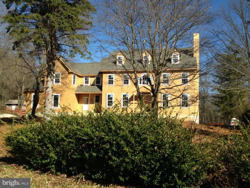 5 Bedroom Center Hall Stone Colonial on sunny level lot with room for a pool; 2 fireplaces and hardwood floors; Large Master bedroom suite with his and her walk-in closets, large first floor family room and breakfast room that overlooks the large yard. Completion is scheduled for Late Spring 2014.