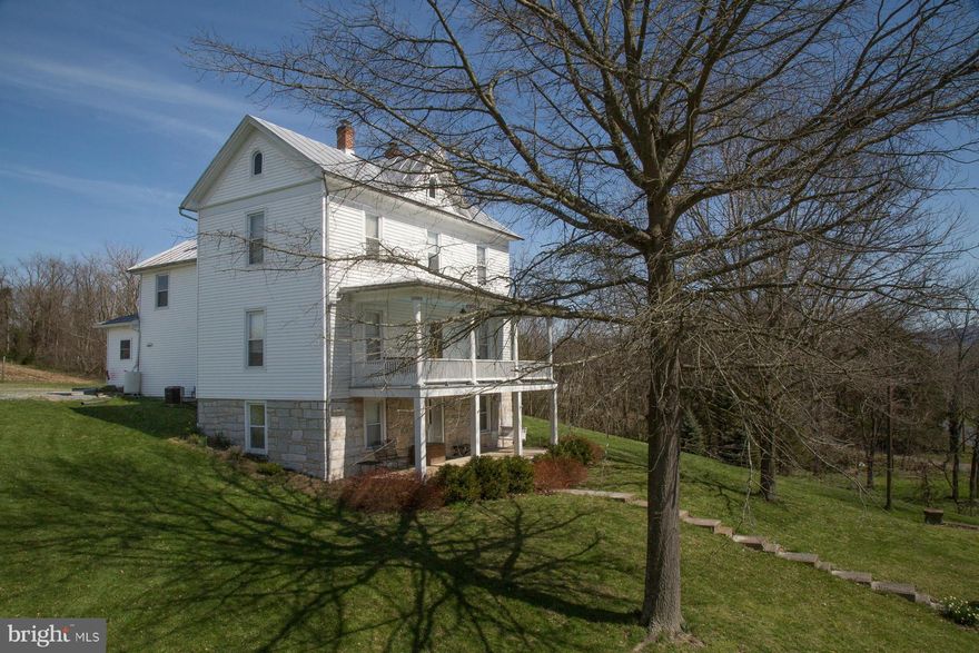 Late 1800s home w/ Native Limestone foundation brought tastefully into 21st Century. New kitchen 2012. Granite counters, stainless steel appliances, 5 Burner gas stove w/ double electric/convection oven. Original woodwork, main level MBR, 3 BR + Sitting Room upstairs. Spacious deck, Two story porch overlooks Stoney Creek. Fixed stairs to attic. Full walkout basement. Immaculate! Call today!