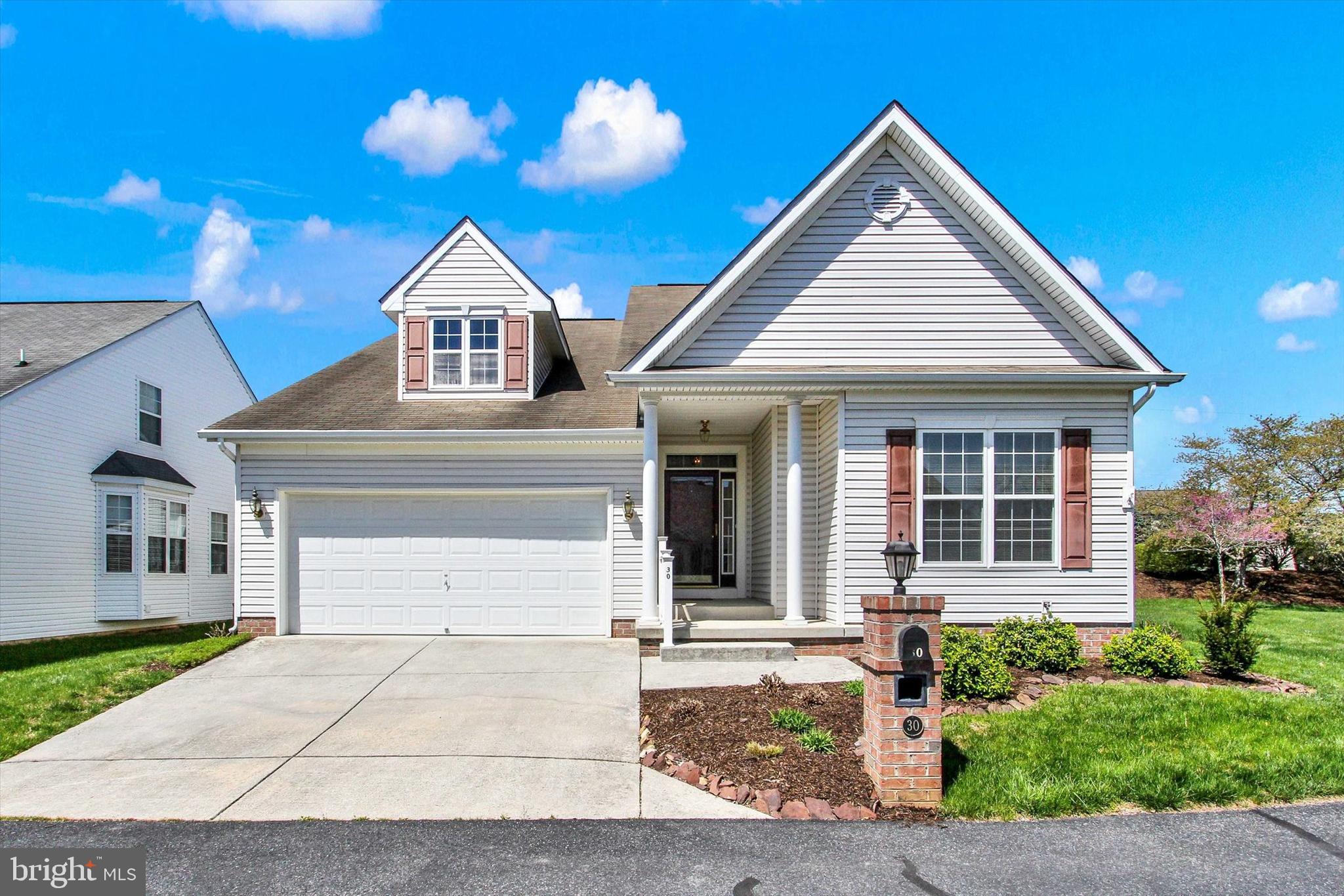 Often sought-after, seldom listed home in Camelot Square. Small tucked-away, beautifully land-scaped community, just 6 minutes (2.5 miles) from Historic Gettysburg Square. This open floorplan, very bright and light, 4 Bedroom, 3 full bath, 2339 sqft home, built in 2003, has real hardwood floors, gas fireplace , cathedral ceiling, and bay/bow window in great room/dining area. Other first floor rooms have 9' ceilings, including primary bedroom with on-suite full bath, double sink, soaking tub and walk-in closet. Kitchen with pantry and gas stove, Main level laundry room. 2 more 1st floor bedrooms and 2nd level bedroom, full bath and loft. Composite deck on rear of home. Basement with windows and Bilco stairs has rough-in plumbing for bathroom, a brand new water heater, passive radon pipe under stairs, and sump pump that has public water back-up unit to keep it running if electric goes off. So much to love about this house. Come take a look !