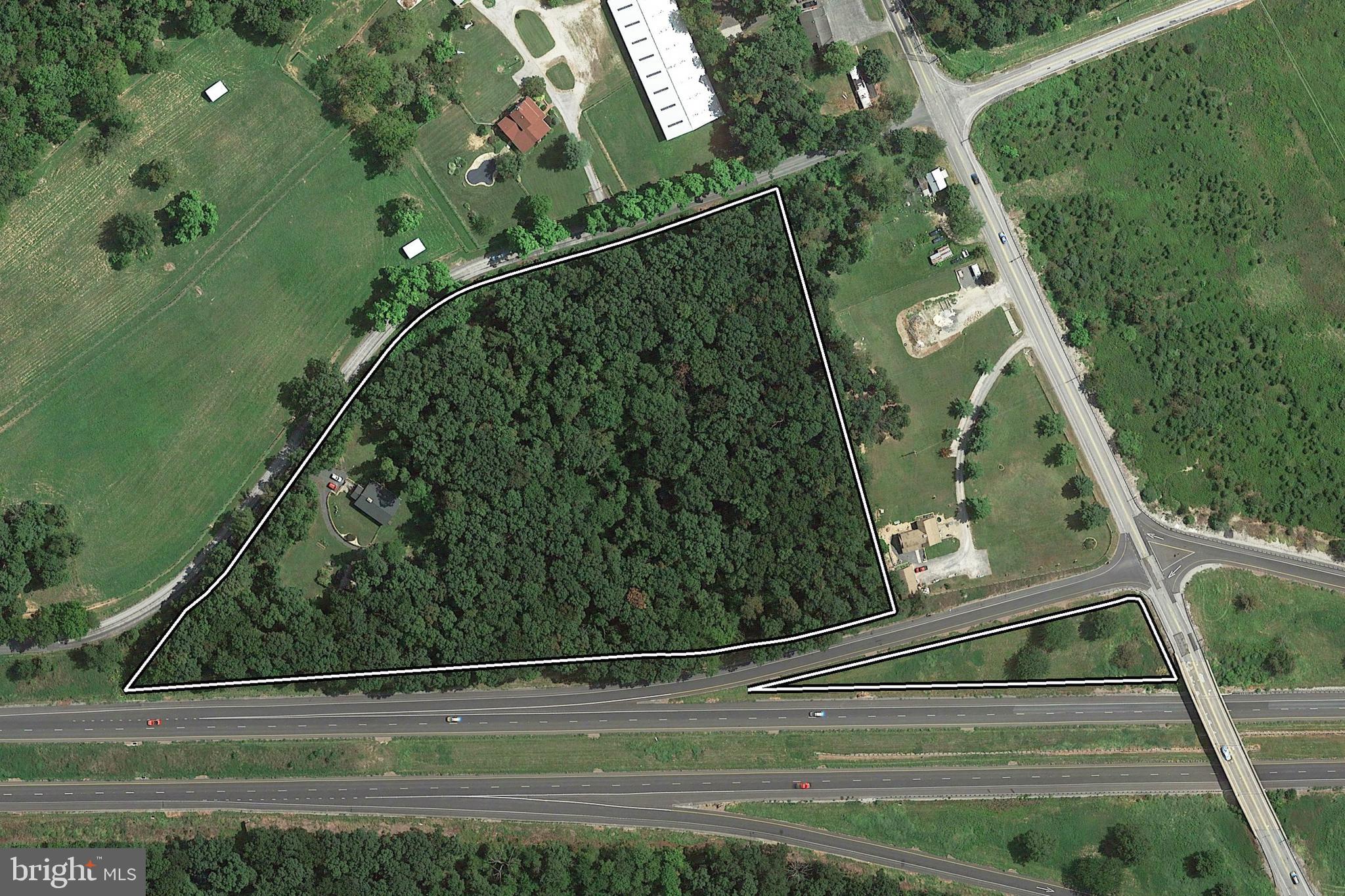 Spread across a generous 8+ acres, this property is a dream come true for those seeking both a cozy retreat and a savvy investment opportunity—possible subdivision with residential area of 2+ acres and commercial land of 5+ acres.
Prime Commercial Opportunity in the Heart of Tyrone Township.
Unlock the potential of this highly desirable property located within the Highway Commercial (HC) District of Tyrone Township. This area is meticulously designed to support a dynamic mix of automobile-oriented businesses while promoting visually appealing and sustainable development. Its strategic location near key roadways ensures easy access, making it an excellent investment for those seeking to capitalize on the region’s growing commercial demands.
Exceptional Zoning Benefits
The HC District permits a broad range of commercial uses tailored to diverse business needs, including:
Retail Establishments: From home and garden supplies to arts and crafts, this zoning supports a variety of retail opportunities to attract customers.
Restaurants and Hospitality: Develop restaurants or boutique hotels and motels to cater to local residents and travelers alike.
Professional Services: Banks, financial institutions, and other business services are well-supported, excluding drive-through options, ensuring a serene yet accessible environment.
Automobile-Oriented Businesses: Ideal for automobile, motorcycle, and boat sales or services.
Commercial Recreation Facilities: Fitness clubs, recreational centers, and similar establishments thrive in this zoning.
For developers with unique visions, conditional uses such as drive-through banks, fast-food establishments, and planned shopping centers offer additional opportunities.
Designed for Success
The Highway Commercial District is more than just zoning—it’s a framework for high-quality development that prioritizes functionality, safety, and aesthetic appeal. Key design features include:
Enhanced Visual Appeal: Thoughtful landscaping requirements include tree-lined parking areas, vegetated buffers, and terminal islands to create a welcoming atmosphere.
Optimal Accessibility: Limited curb cuts, common access driveways, and logical circulation patterns minimize traffic disruption while improving safety and accessibility.
Future-Ready Standards: Building placement and design standards are set to accommodate future roadway expansions, ensuring long-term value.
Comprehensive Site Planning: Strict guidelines for parking layouts, refuse areas, and outdoor storage ensure cohesive, professional developments.
Unmatched Location and Connectivity
Located near major interchange areas, this property offers seamless connectivity for businesses that require proximity to a robust transportation network. The district encourages uses that align with the area's existing infrastructure while discouraging developments requiring extensive roadway modifications, ensuring stability and sustainability for businesses and the community.
Invest with Confidence
This district is meticulously regulated to maintain a balance between development and the community's aesthetic and functional needs. Area and bulk requirements ensure properties retain a harmonious design, with ample lot sizes, appropriate setbacks, and limits on impervious surfaces for environmentally responsible development.
Why Wait?
Whether you envision a vibrant retail hub, a unique dining destination, or a state-of-the-art service center, the Highway Commercial District in Tyrone Township provides the ideal canvas. Act now to secure your place in this thriving commercial corridor and bring your business vision to life!