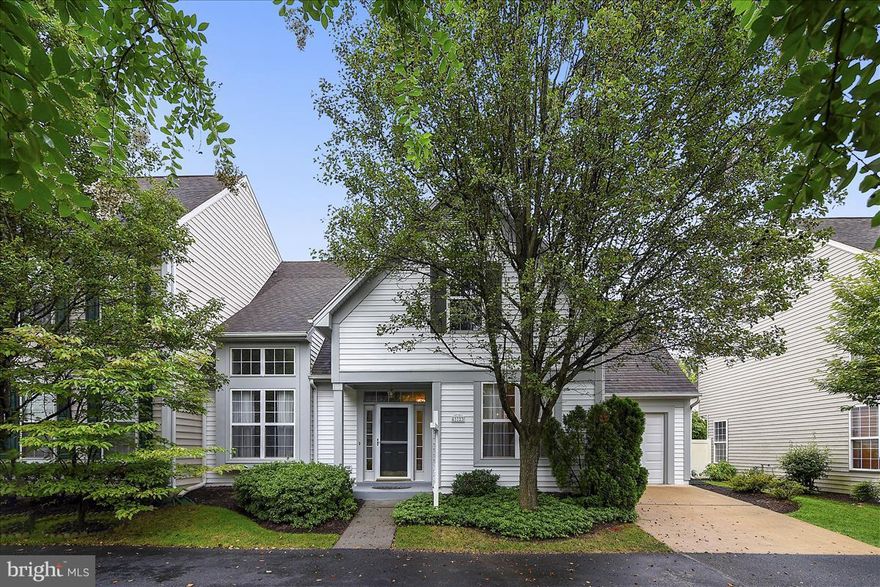 Rarely available Barraud model with first floor master. Updated kitchen w/ gas stove and quartz cntrtps. Brand new engineered. hardwoods on main level. Dramatic two story living room and formal dining room. Large loft plus storage area on 2nd floor in addition to the BRs. Freshly painted throughout. Beautiful and private fenced rear yard.