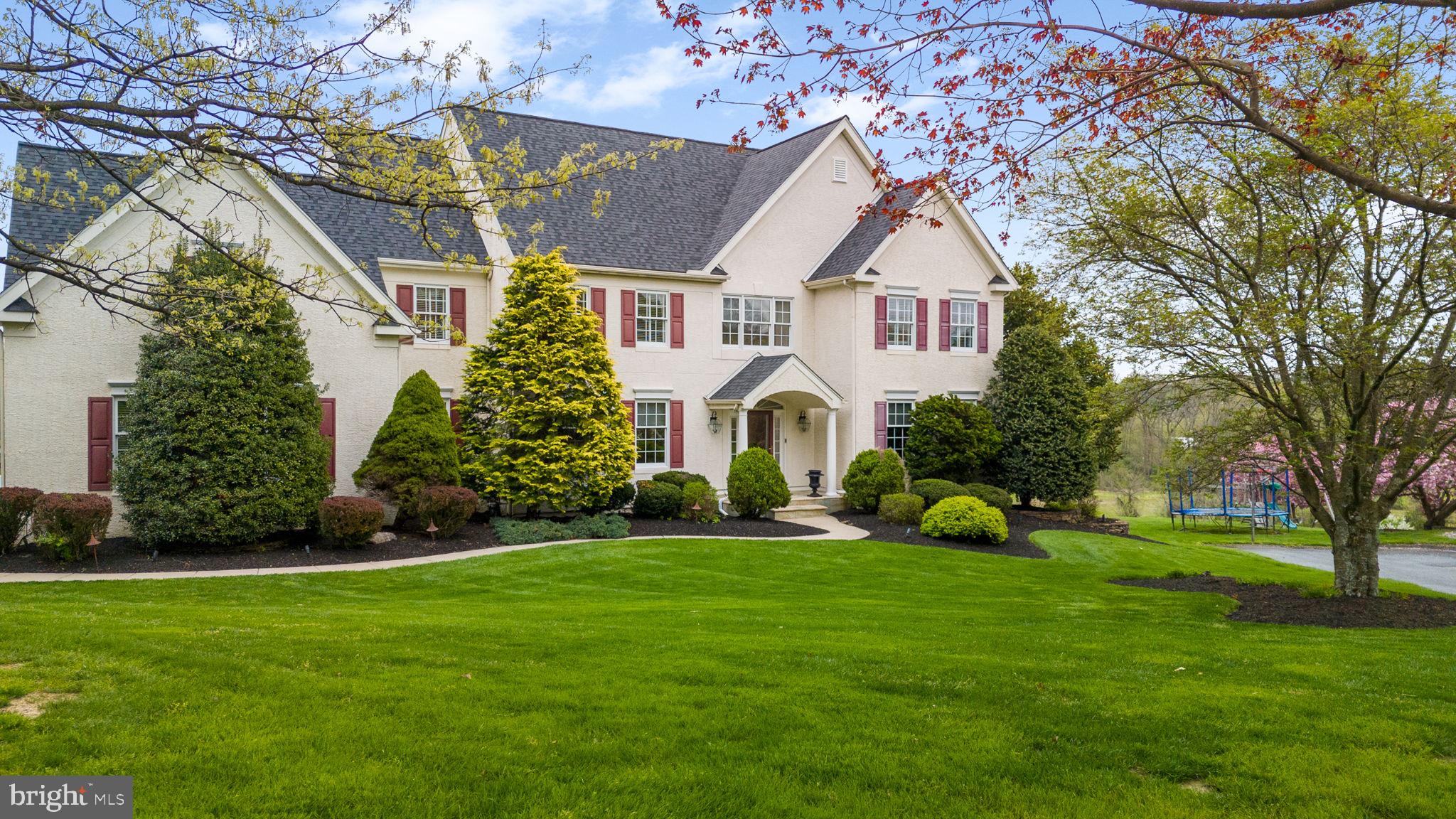 Welcome to this stunning property nestled within the prestigious Steeplechase at Radley Run community, offering an exquisite blend of modern updates and timeless elegance. This beautifully updated home has been meticulously maintained, including stucco remediation in 2018 by Reaction Exteriors.
Situated on a premium lot backing to open space, there is an unparalleled sense of tranquility and privacy. As you step inside, you are greeted by a grand foyer leading to a private office adorned with built-ins and French doors, ideal for those seeking a dedicated workspace.
The formal dining room, complete with custom molding and a butler's pantry featuring cherry cabinets, sink, and bar area, sets the stage for family dining experiences. Across the foyer, the formal living room provides additional entertaining space, accentuated by custom moldings and French doors leading to the family room.
The family room, centered around a gas fireplace with a raised hearth, seamlessly flows into the lovely sunroom, screened in for enjoyment year-round. The kitchen is a chef's delight, boasting newer two-toned cherry cabinets, an oversized black island, ample storage space, and gorgeous granite countertops, all complemented by updated appliances.
Convenience is key with a rear laundry room, mudroom, and access to the garage and lower level. Upstairs, the beautiful primary bedroom awaits with custom tray ceiling, spacious walk-in closet, and luxurious ensuite bathroom featuring double sinks, a master shower, and a soaking tub. A private sitting room accessed through the owners' suite provides a great space that can be used to enjoy a book, exercise or as a second office.
Three additional generously sized bedrooms await, including a princess suite with a walk-in closet and private bathroom, and two bedrooms sharing a Jack and Jill bathroom, each with their own vanities. The finished, walk-out lower level is an entertainer's dream, featuring a custom bar with dishwasher, refrigerator, and ice machine, two distinct entertaining areas, a gas fireplace, and full bathroom.
In the rear of the home you will find numerous outdoor living spaces including a large deck and stunning patio, adorned with customized tile and a stone wall, overlooking the expansive rear yard and the breathtaking open space of the neighborhood. With its Blue Ribbon schools, convenient access to shopping, roadways, and the West Chester Borough, this impeccable home offers the perfect blend of luxury, comfort, and convenience. Don't miss the opportunity to make this quality home your own! Schedule your showing today.