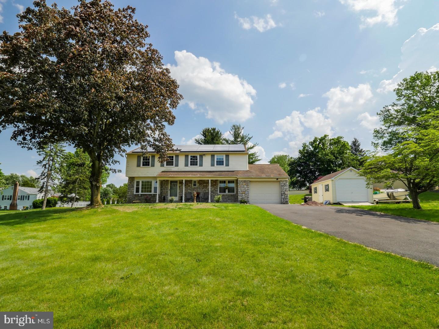 Welcome to 5 Kitty Knight Drive, a four-bedroom colonial prominently standing on a threequarter acre corner lot in the Willow Greene Community. This home boasts great outdoor living with swimming pool,updated gourmet kitchen and the nationally ranked Council Rock School District. Beautiful stone work enhances the inviting covered porch and takes you inside through the foyer. The formal living room brings in a soft infusion of natural light as the crown molding and ceiling fan add an elegant appeal. Beautiful hardwood floors lead from the foyer to the formal dining room where a softly contrasting two tone appeal creates a palette of earth tones for your dining setting. The updated eat-in kitchen reflects todays buyers must haves, including long stretches of gleaming granite counters, an abundance of striking brazalian cherry cabinetry, stainless steel appliances and a beverage fridge that can keep you or wine or juice boxes at just the right temp. Other highlights include a blended tiled backplach, tiled floor, inset artist plaque above the stove and a hinged glass door that lends access to the screened porch. A long brick hearth adds character and warmth to the family room as the neutral colors,hardwood floor and airy ambiance make this a day-to-day gathering spot. Upstairs the master suite is ready to embrace the owners with a serene mood for starting and ending each day. The vast bedroom with lighted ceiling fan and shutter clad windows enjoys a cozy nook, perfect for making a comfy reading area. The master bath also offers natural light and a spacious appeal with neo angle glass shower enclosure. Three additional bedrooms on this level are all nicely sized, have double closets and architectural details in the ceiling for an added appeal. The hall bath full tub/shower enclosure completes this level. A shady retreat, the large screened-in porch that gives you full view of the backyard including playset and swimming pool. Call today for your personal tour, this home with its spacious living, great Bucks County location with top schools and sprawling will not last long! "You will also enjoy premium solar panels on the home. Solar energy can save in monthly bills, increase future home value, and provide guaranteed performance."