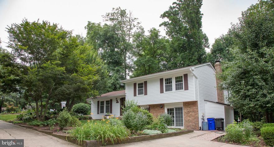 Rare find in the heart of Columbia.  Cul-de-sac location, backing to  woods with walking path to lake, great landscaping, new gourmet kitchen, fresh paint, and new carpet.  Enjoy the new deck overlooking your private backyard.  Awesome enclosed sunroom and much, much more. Renovations will be complete in 30 days. 2700+sq ft of living space.  Get your clients ready, this will not last long.