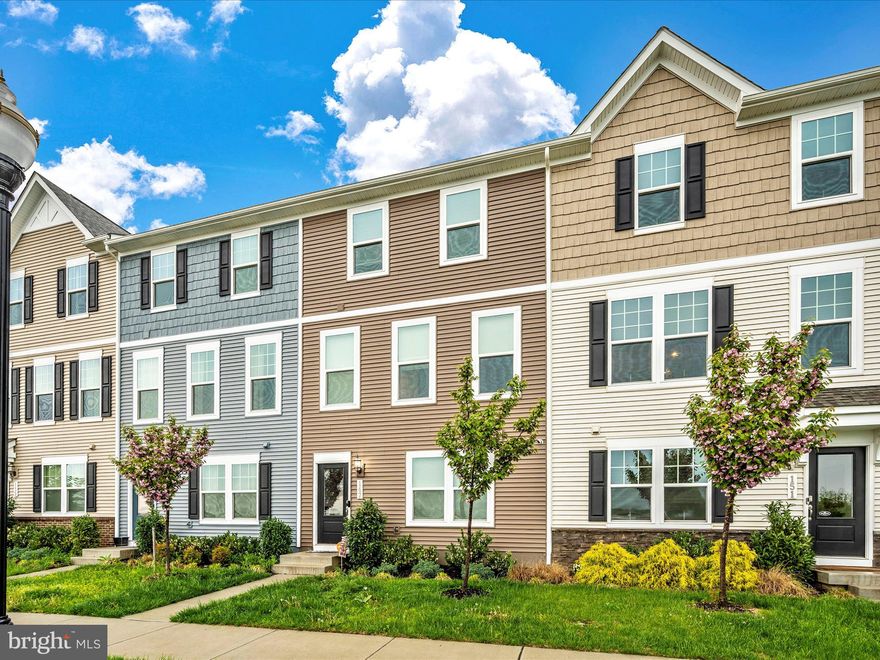 Welcome home to this beautiful "Hastings" model! Less than 4 years young, full of builder options, and available NOW! WHY WAIT for a new build delivery? Featuring 3 finished levels with upscale inspired finishes including a modern, open floor plan offering an abundance of natural light. The gourmet kitchen features quartz countertops, a large island, upgraded cabinets and maintenance free flooring. This modern innovative floor plan also features a serene primary suite with full bath, 2 additional large bedrooms, and a large open living space for family and friends, as well as a spacious deck for enjoying the outdoors. Enjoy off street parking and a large 2 car garage! It is conveniently located just minutes from Route 9, 15 and 7 for easy commuting. Convenient location- walk to shops and restaurants. Just minutes to recreational destinations such as Harpers Ferry, Charlestown and more!