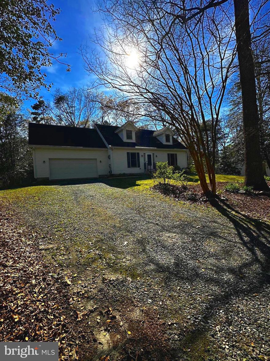 MOTIVATED SELLER!!   WELCOME TO 10958 PIT ROAD, SEAFORD, DELAWARE.   THIS CHARMING AND WELL MAINTAINED 4BR 2 BATH HOME OFFERS 1,900 SQ. FT.  OF LIVING SPACE.   THIS OUTSTANDING HOME FEATURES A GREAT FLOOR PLAN.  1ST FLOOR OFFERS LIVING ROOM W/COZY FREE STANDING  GAS FIREPLACE AND LAMINATE FLOORING, KITCHEN W/EATING BAR OFFERS OAK CABINETS, LAMINATE FLOORING, DBL SINK, ALL APPLIANCES INCLUDING REFRIGERATOR, RANGE W/RANGE HOOD, MICROWAVE, DISHWASHER (NEW - 2026), AND STACK WASHER/DRYER,  DINING AREA OFFERS CHAIR RAIL MOLDING AND LAMINATE FLOORING,  2 BEDROOMS W/CARPET AND NEWLY RENOVATED BATHROOM W/WALK-IN SHOWER PLUS SLIDING GLASS DOOR LEADING TO DECK AND BACKYARD.    2ND FLOOR OFFERS 2 SPACIOUS BEDROOMS, RENOVATED BATHROOM W/WALK-IN SHOWER PLUS 24' X 11' STORAGE AREA JUST OFF ONE BEDROOM THAT COULD BE EASILY TRANSFORMED INTO A LARGE WALK-IN CLOSET, DRESSING/SITTING AREA OR WHATEVER YOUR HEART'S DESIRE.   PROPERTY ALSO OFFERS NEW ROOF IN 2016 AND NEW TRANE HEAT PUMP IN 2024 PLUS ATTACHED OVERSIZED 2-CAR GARAGE, GENERAC BACK-UP GENERATOR AND GAZEBO.  THE PROPERTY IS ON JUST OVER 1/2 ACRE OF LAND AND FEATURES LOVELY POLLINATOR GARDENS THROUGHOUT THE YARD THAT OFFER PERENNIALS THAT COME BACK EVERY YEAR MAKING THIS PROPERTY PICTURE PERFECT (SEE PHOTOS ATTACHED).    HOME BACKS UP TO THE NANTICOKE RIVER WATERSHED CONSERVANCY THEREFORE IT CAN NEVER BE DEVELOPED AS TO PROMOTE THE PROTECTION AND BALANCED USE OF THESE LANDS.