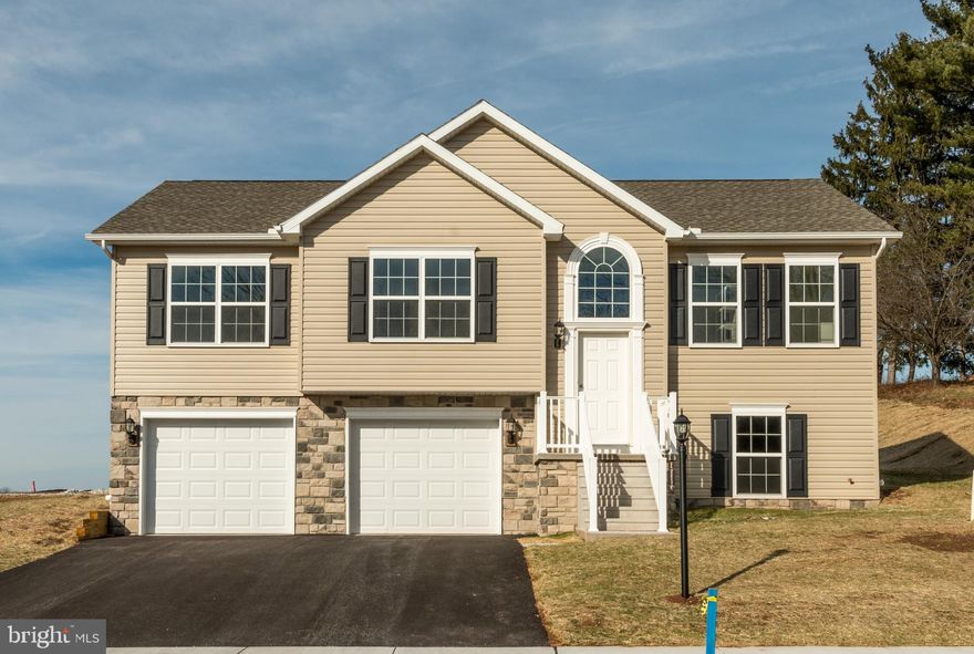 ****TO BE BUILT ASPEN II or CHOOSE YOUR MODEL FROM OUR LIST! ##VISIT MOEDL HOME/SALES OFFICE AT 2601 VILLAGE RD, DOVER, PA, FOR MORE INFORMATION## **** SPECIAL INCENTIVES UP TO 10K MAY BE AVAILABLE WITH THE USE OF PREFERRED LENDER & TITLE***** 
We welcome two Split Foyer Homes now able to be built in our community! Introducing our ASPEN II! The split foyer design, always a favorite of homeowners who want room to expand at their own pace, has been totally revamped by J.A. Myers Homes, with a more aesthetic exterior and a much more practical, open floor plan. A striking story-and-a-half foyer welcomes you to the Aspen II. Just a few steps up there’s a spacious living room with its sweeping cathedral ceiling. The adjacent dining room snuggles close to a well-planned kitchen, complete with pantry. The nicest feature of this area is the openness, allowing the cook to be part of the activities, and the dining area to easily expand into the living room for parties or family gatherings. Outdoor access from a door in the dining room means that the entertaining space can be doubled, in the form of a deck or sunroom. Two good-sized bedrooms, a full bath, and a handy main floor laundry area complete the left side of the house. But…ah! The right side has its own story to tell! The lovely owners suite is one of the Aspen II’s most outstanding features. Peace and quiet dominate the area, due to solid walls that stifle noise. A large window allows light to spill into the room when you want it; but window coverings can keep it darkened when you have a chance to sleep in. A luxurious bath with a separate tub and walk-in shower is compartmentalized for easy sharing. A huge walk-in closet completes the suite. Incentives may be available with the use of Builder Preferred Lender and Title Company.