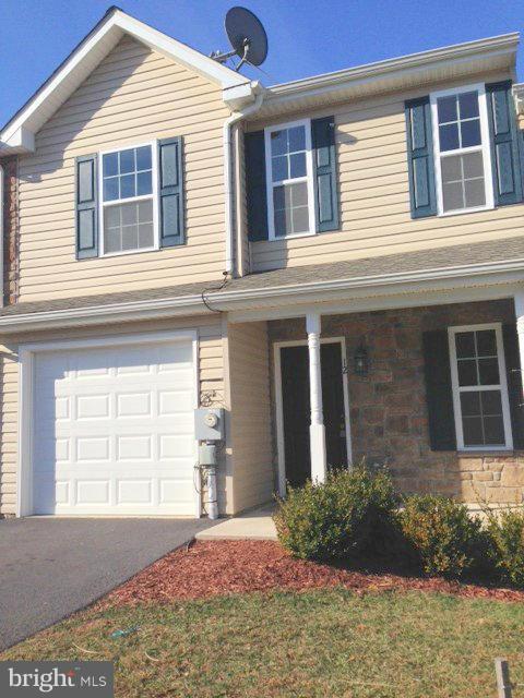 Don't miss the opportunity to own this beautiful 3 Bedroom 2.5 bath patio style townhome with one car garage. Spacious interior, front porch, rear patio, breakfast bar in kitchen, tile flooring in bathrooms and kitchen. Enjoy all the conviences of living close to shopping and more. Like new, no need to wait to build. Lots of upgrades! A must see!!
