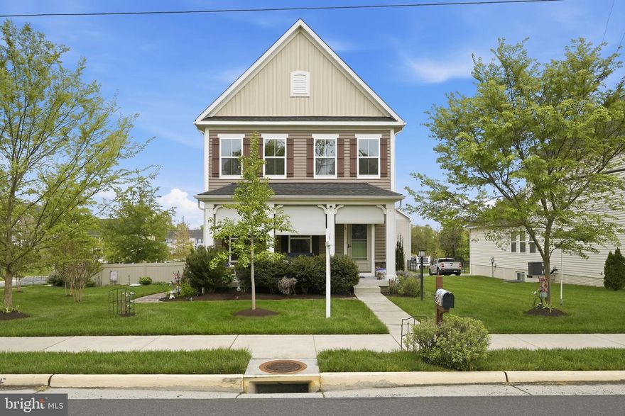 Welcome to an exceptional residence in the highly sought-after Villages at Lovettsville, where timeless charm meets modern sophistication. Perfectly positioned at 15 S Locust St, this beautifully appointed home offers 4 bedrooms, 3.5 bathrooms, and a 2-car garage tucked at the rear of the property, thoughtfully designed for elevated everyday living.

From the moment you arrive, the home’s stunning curb appeal sets the tone—featuring professionally landscaped grounds and a meticulously maintained yard that reflects true pride of ownership. Every detail of the exterior has been carefully curated, creating a warm and inviting first impression.

Inside, enjoy light-filled interiors, refined finishes, and a seamless open-concept layout ideal for both intimate gatherings and elevated entertaining. The gourmet kitchen flows effortlessly into the main living and dining spaces, offering both function and style. Upstairs, retreat to the luxurious primary suite, complemented by generously sized secondary bedrooms and well-appointed baths. The fully finished lower level, complete with a full bathroom, provides versatile space ideal for a private guest suite, executive home office, or upscale recreation area.

Step outside to a beautifully designed, fully fenced side yard featuring custom hardscaping by Wildwood Landscape, a thoughtfully crafted walkway, and a dedicated grill pad. A rear covered porch off the family room offers a perfect spot for relaxing or entertaining, providing both comfort and style. Enhancing convenience and efficiency, the home includes a built-in EnviroAire whole house humidifier, a NEW sump pump, and a whole house metered water filtration system. With over $40,000 in recent owner improvements, this home delivers a truly turnkey experience.

Enjoy the best of small-town living within walking distance to Downtown Lovettsville, the Lovettsville Community Park with an equestrian center, baseball and soccer fields, walking trails, a dog park, and much more. Also nearby are the community center, elementary school, library, and a variety of popular dining options, including Backstreet Brews for coffee, Andy’s in Lovettsville, Rodeo Mexican Grill, and many more restaurants at the Town Circle. Experience a rare blend of elegance, comfort, and community in one of Loudoun County’s most desirable locations.