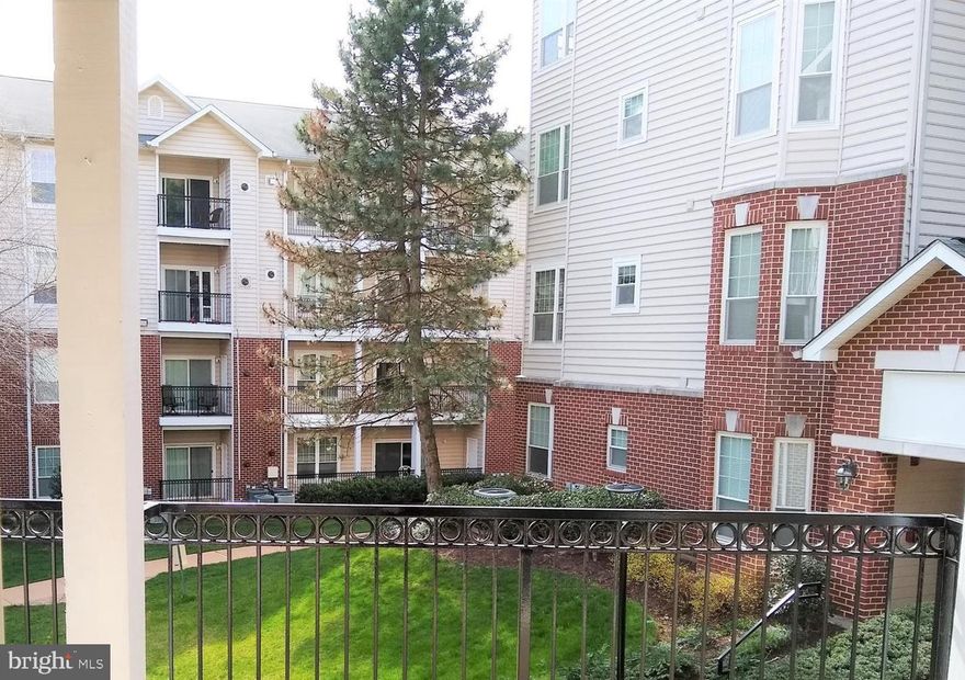 Welcome home to one of the largest two bedroom units in the Gates of McLean. This corner unit condo features ample windows and Southern exposure creating a warm, light and bright, inviting home year round. Updated kitchen with granite counter tops and black appliances opens to the large bright living room featuring a gas fireplace and sliding glass doors to the over-sized private patio. Split floor plan for maximum privacy with each bedroom featuring their own bathroom and large walk in closets with custom organizers. Large laundry room with full sized newer washer and dryer plus storage space. Fabulous commuter location: take a short stroll to the McLean Metro Station or quickly get on the 495 or 267. Just a hop skip and jump away from Downtown DC, Tysons Corner, Reagan Nation Airport, and all of the DMV area. Walking distance to the new Capital One center featuring City Works Brewery, Starbucks, and soon Wegmans and more. Capital One Center will bring this vibrant community together with restaurants, shops, community events, and a state-of-the-art performance hall. Community features resort like pool, gym, community center, bike storage, and tot lot.