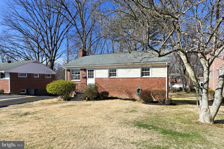 A gem, in move-in condition on quiet street. Walk out basement w/loads of light, 4th bedroom w/attached full bath. Updated baths. Delightful deck off DR. Kit is mid-century modern style in perfect condition. DR door to deck makes living area brighter than most, & kit larger w/out a back door. Replacement windows, Gleaming hardwood flrs. 1/2 mile to Giant in Graham Park Plaza, Metrobus .6 mile.