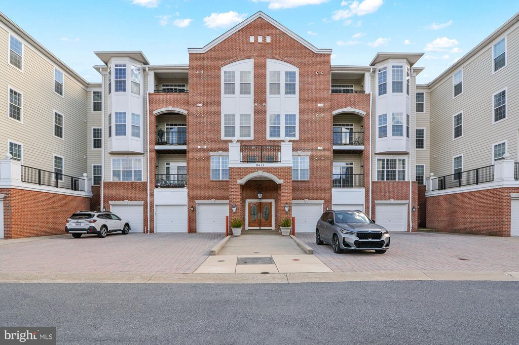 Photo of 8615 Wandering Fox Trail #406, ODENTON, MD 21113 (MLS # MDAA2129516)