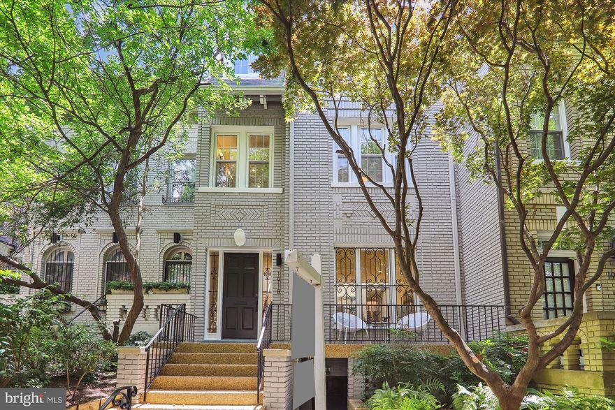 Stunning, completely renovated, contemporary 1915 Kalorama Triangle Townhome.  4Bedroom/3.5Bath plus bedroom level sitting/office space and expansive loft/playroom/office.  Over 4628 SF of living space including the lower level.  Lower level separate entrance.  This architectural stunning renovation with high ceilings, archways, 2 fireplaces flows beautifully for entertaining and spacious living.  The main level expansive Living Room flows into the large Dining Room including a fireplace between.  From there, the sleek butlers pantry functions as a bar for elegant entertaining.  The state of the art Chefs kitchen with a sub zero refrigerator, double ovens, gas cooktop and wine fridge, looks out to the rear patio.  A lovely breakfast area sits in the end area of the kitchen.  Upstairs, the 3 bedrooms occupy the second level, with contemporary baths, an office/flex space, fireplace and W/D.  On the third level, you will find a huge light-filled room, with built in book shelfs and ample space for an office or  playroom. The lower level basement is over 1200 sf, including a living room, bedroom and huge, spa-like bath.  This stunning row home sits walking distance to Connecticut Ave shops and cafes, 2 metro stops, parks and schools. One rear parking spot accessed from the alley.