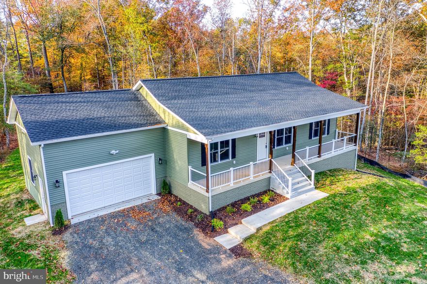 Brand-New 4BR/3BA Country Retreat on 3+ Private Acres

Welcome home to this stunning brand-new raised rambler, perfectly tucked away on a peaceful cul-de-sac in the desirable Malvern community. Set on over 3 acres with a wooded perimeter for privacy, this property offers the perfect blend of comfort, nature, and modern living.

Step onto the charming front porch and take in the sights and sounds of the countryside — the perfect spot for morning coffee or evening relaxation. Inside, you’ll find an inviting open layout with 9’ ceilings, luxury vinyl flooring throughout, and a cozy stone fireplace with built-ins in the living room.

The beautifully designed kitchen features granite countertops, upgraded cabinetry, stainless appliances, and a breakfast bar that opens to the dining area — ideal for entertaining or family meals. A convenient laundry and storage room is just off the kitchen.

The spacious primary suite offers a peaceful retreat with a walk-in closet and a private bath featuring a tile walk-in shower and double vanity. The split bedroom floor plan provides additional privacy, with generously sized secondary bedrooms and a fully finished lower level that includes a large 4th bedroom and 3rd full bath — perfect for guests, a home office, or multi-generational living.

There’s plenty of room to grow with additional unfinished space in the walkout basement and a 2-car garage for storage or hobbies. The large, level backyard is ready for cookouts, pets, and gatherings.

Enjoy the amenities of the Malvern community — including a lake, outdoor pool, clubhouse, and playground — all just minutes from Route 29, shopping, and dining. Comcast high-speed internet available.

✨ Be the first to call this beautiful country home your own!